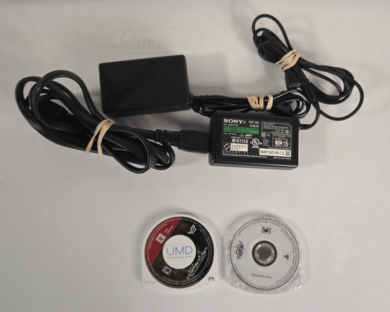 Sony PSP 2000 Matte Bronze Handheld System With 2 Games And Charging Cord Tested