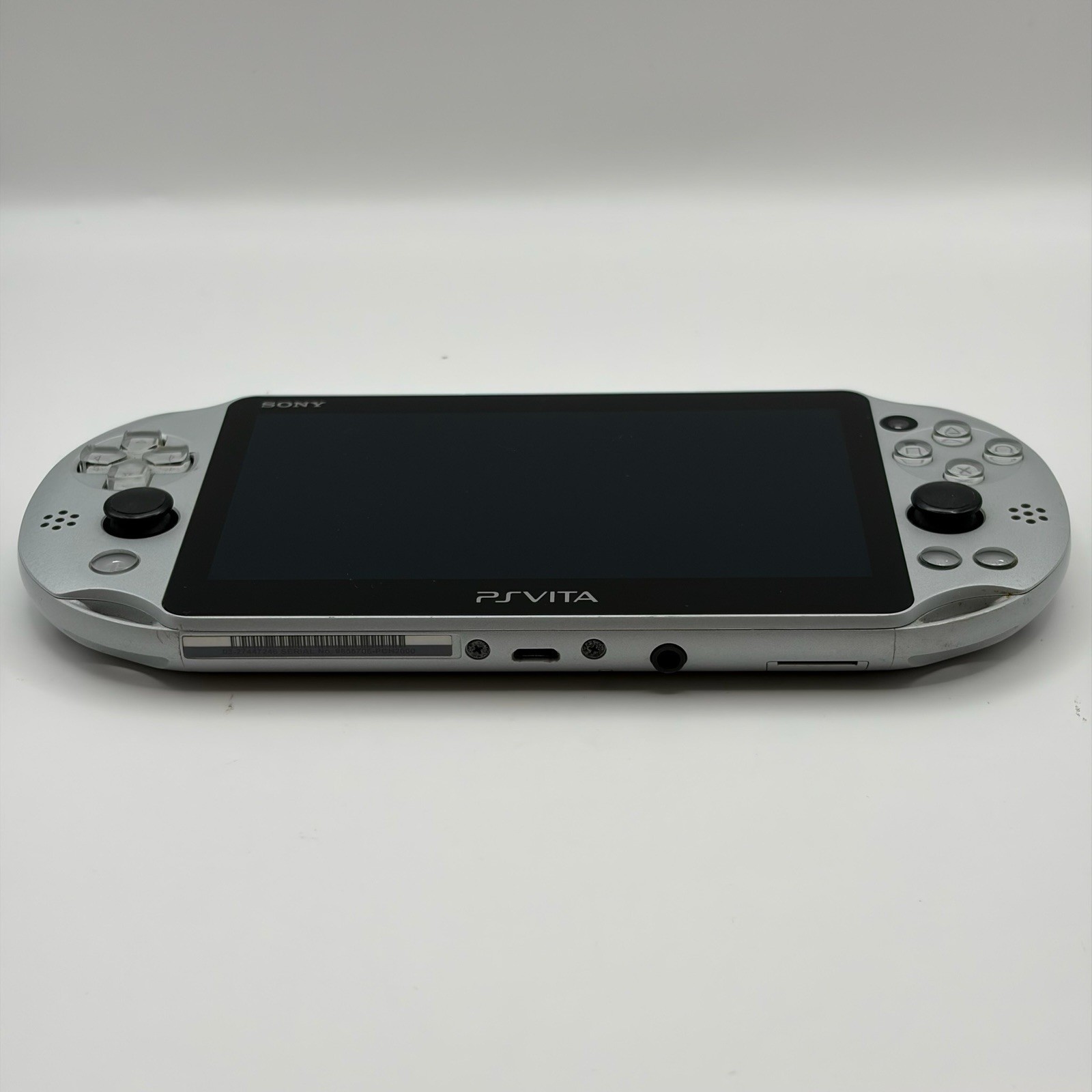 SONY PS Vita PCH-2000 Console Silver Very Good Fast Shipping No joystick drift.