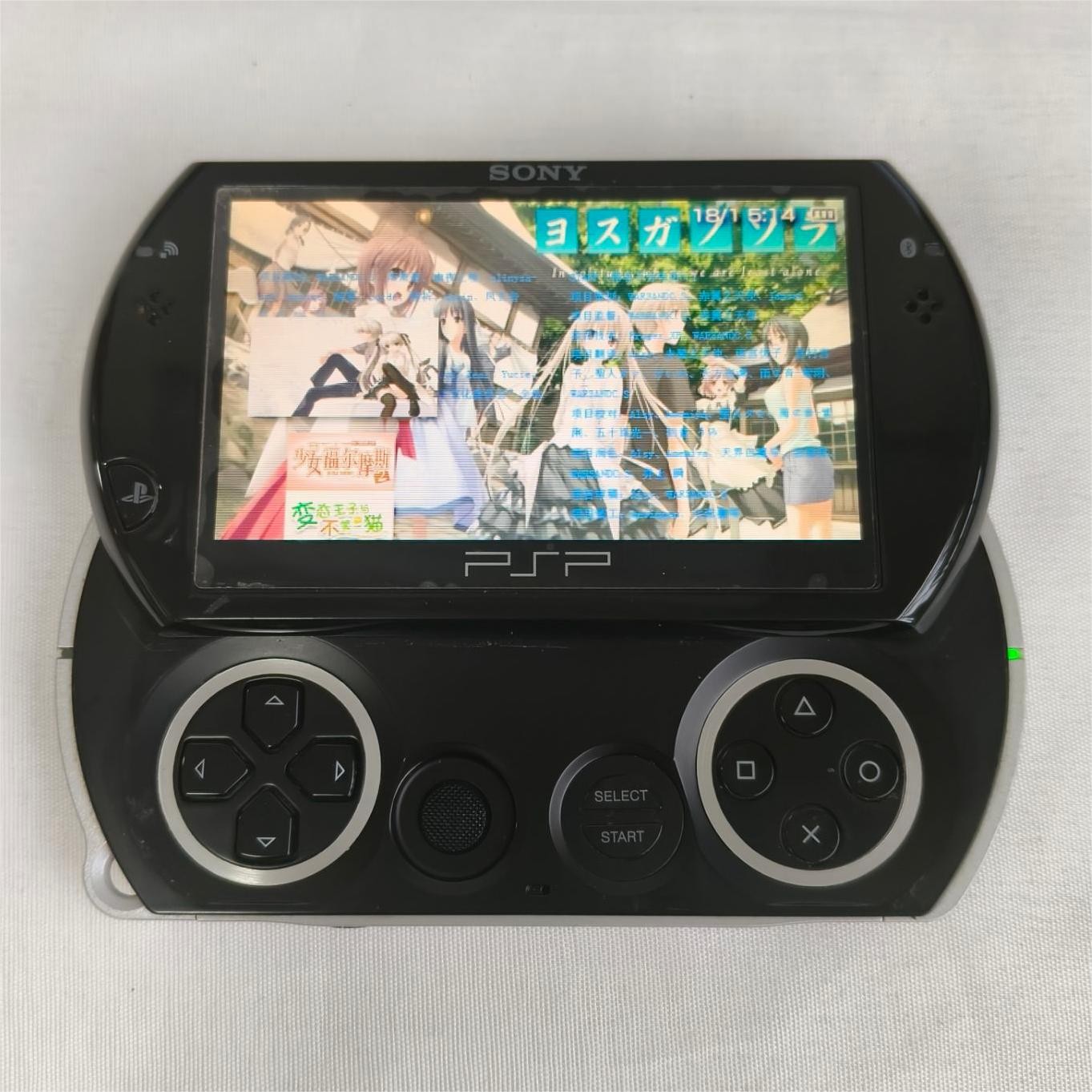 Sony PSP GO console Black with Charger PSP-N1003 Screen with protect