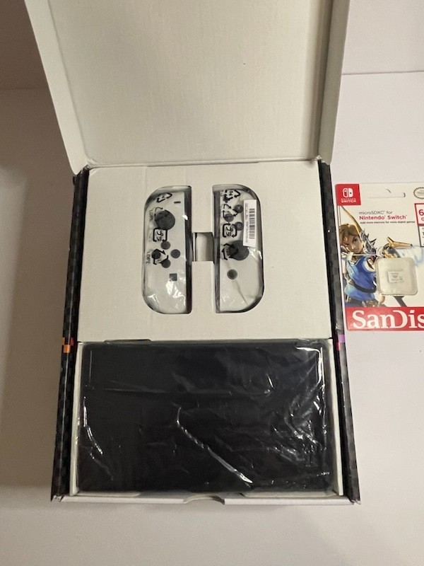 Nintendo Switch OLED – White Joycon With 64gb SD card (no game included)