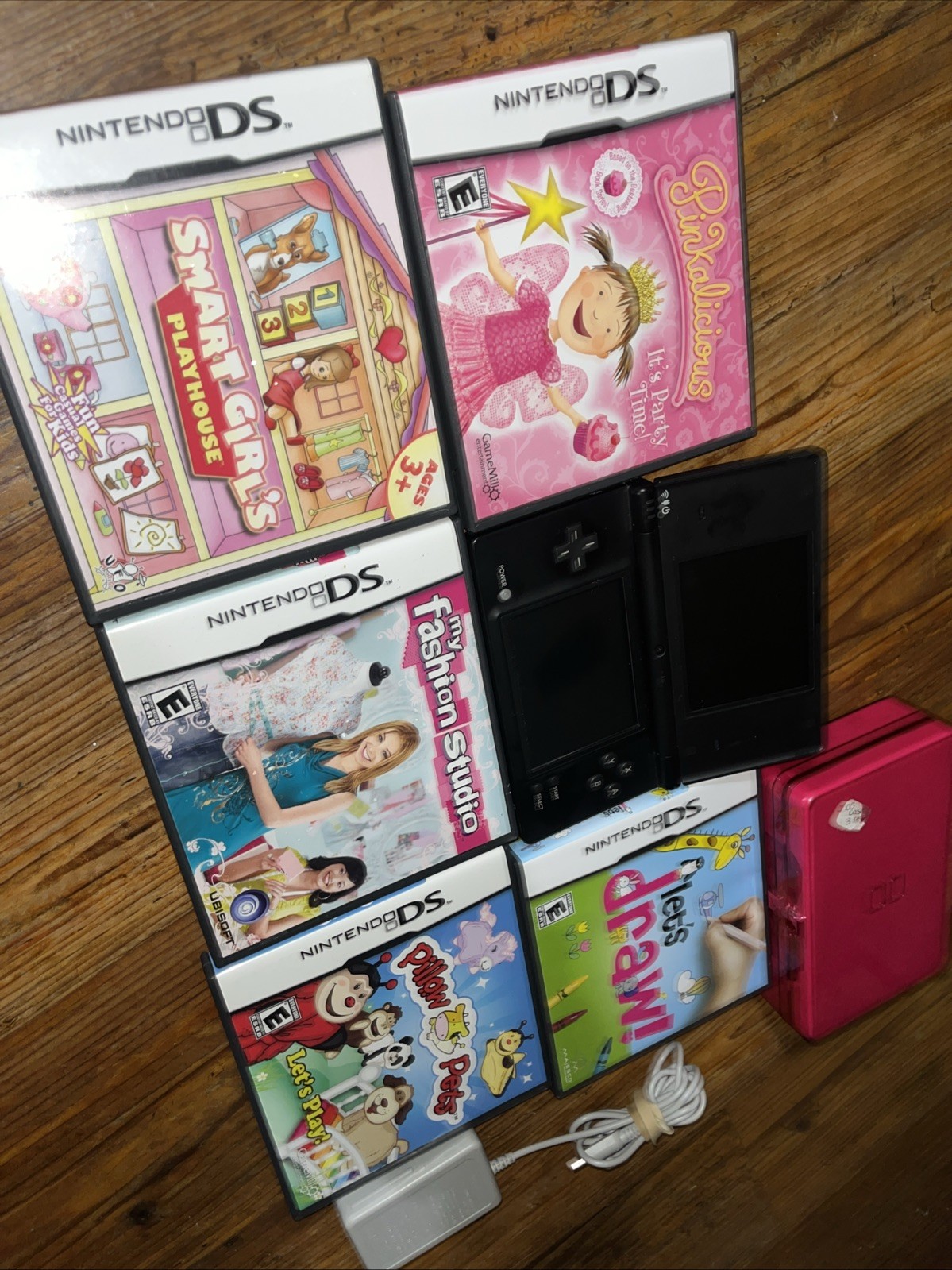 Nintendo DSi (TWL-001) 2008 Black Bundle w/ 5 Games & Carrying Case