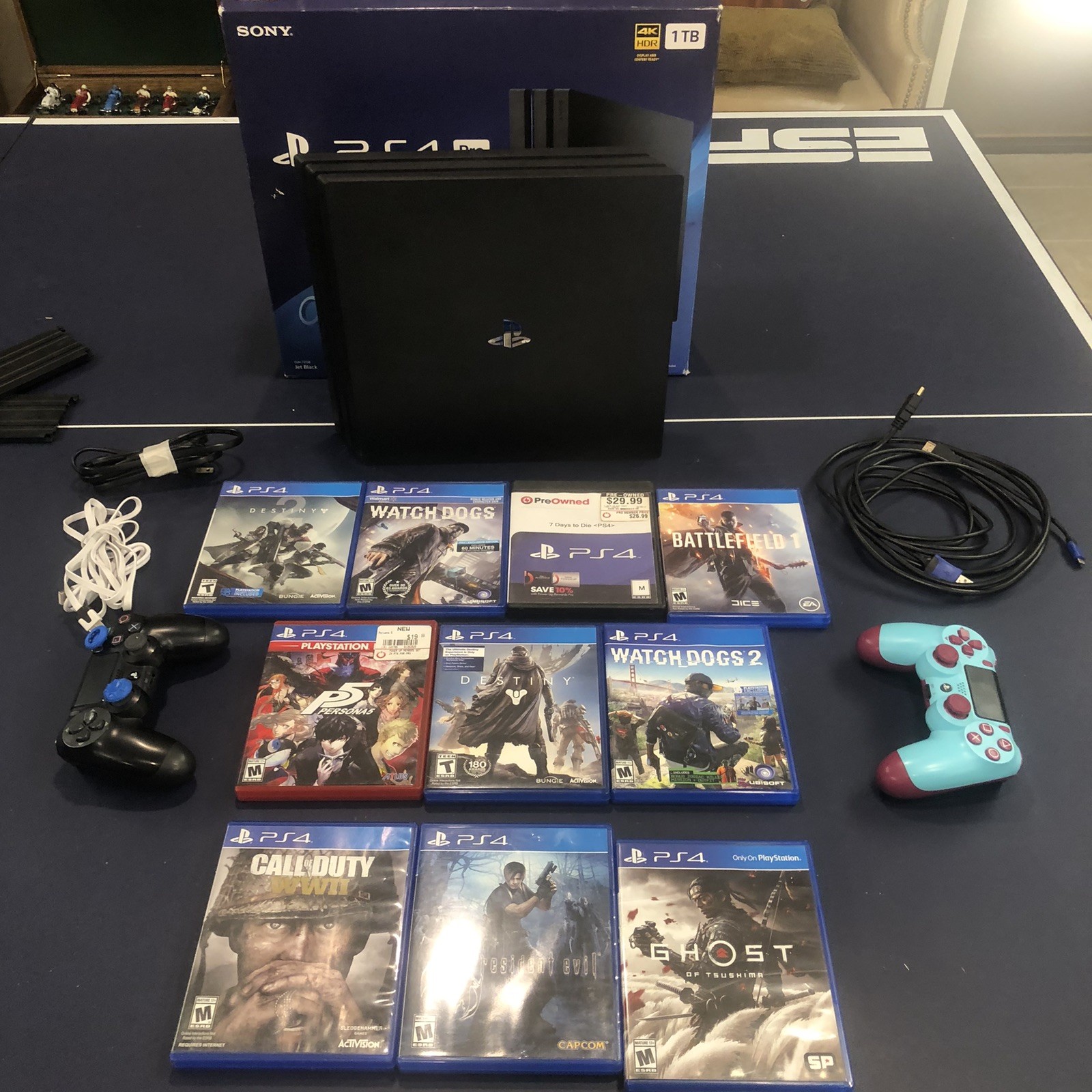 SONY PS4 4K HDR 1 TB – Includes 2 Controllers & 15 Classic Games