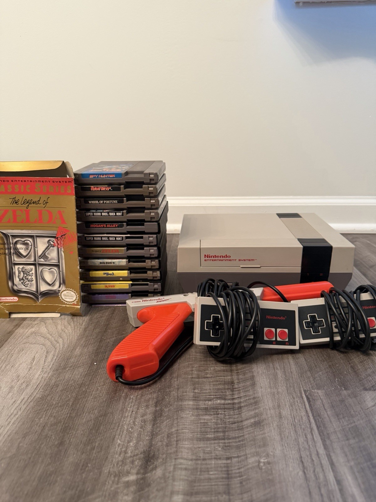 PRISTINE NES Console + 11 Games + Zapper + 2 oem Controllers + 3 Manuals!