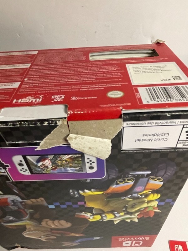Nintendo Switch OLED – White Joycon With 64gb SD card (no game included)