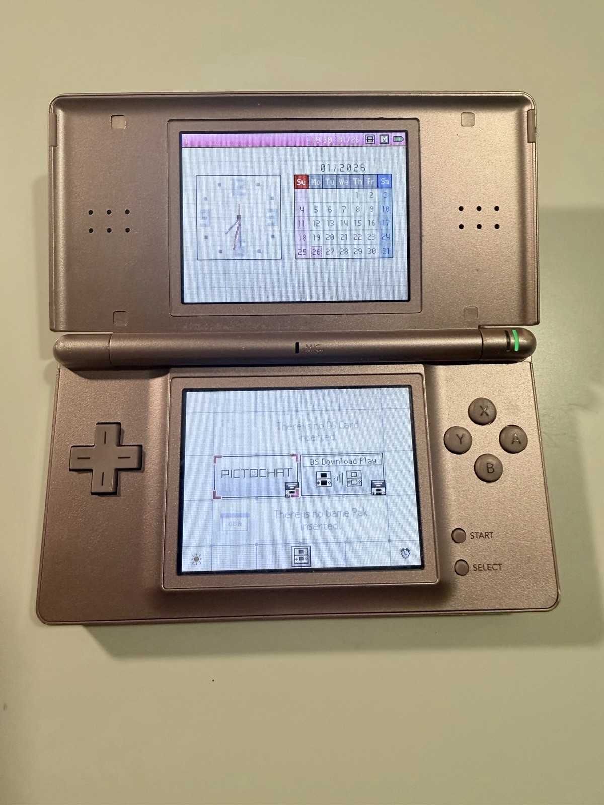 Nintendo DS Lite Metallic Rose System With Charger, Original Box, And 2 Cases