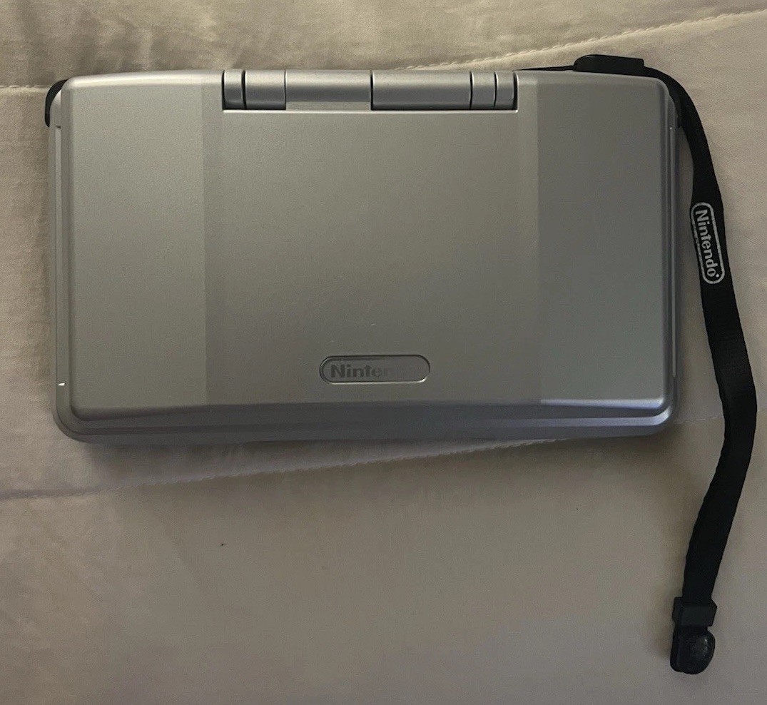 Nintendo DS System Silver NTR-001 WORKS GREAT W/CHARGER, CASE & 2 GAMES EUC