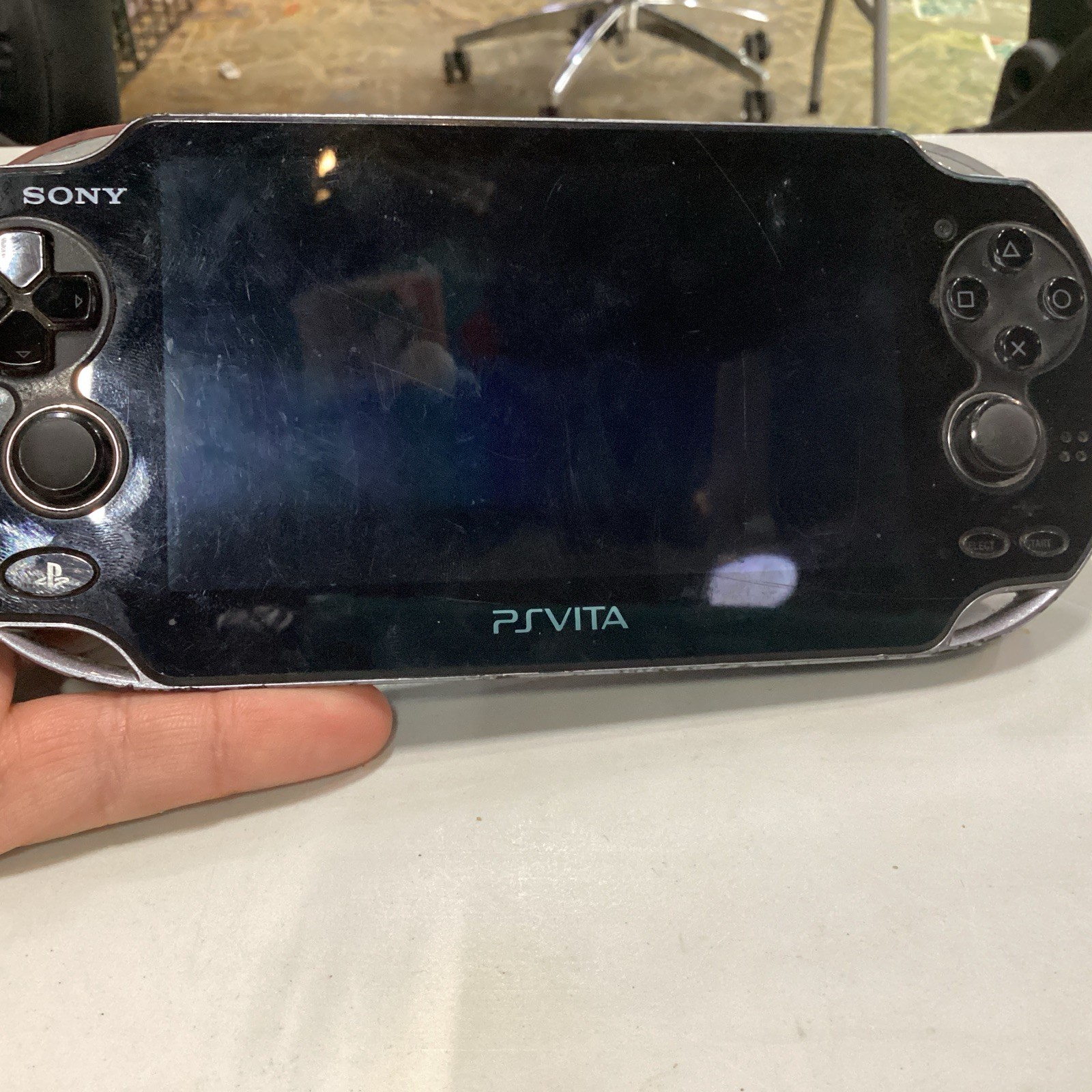 Sony PlayStation Vita PCH-1001 Black Handheld System With Cards And A Carry Case