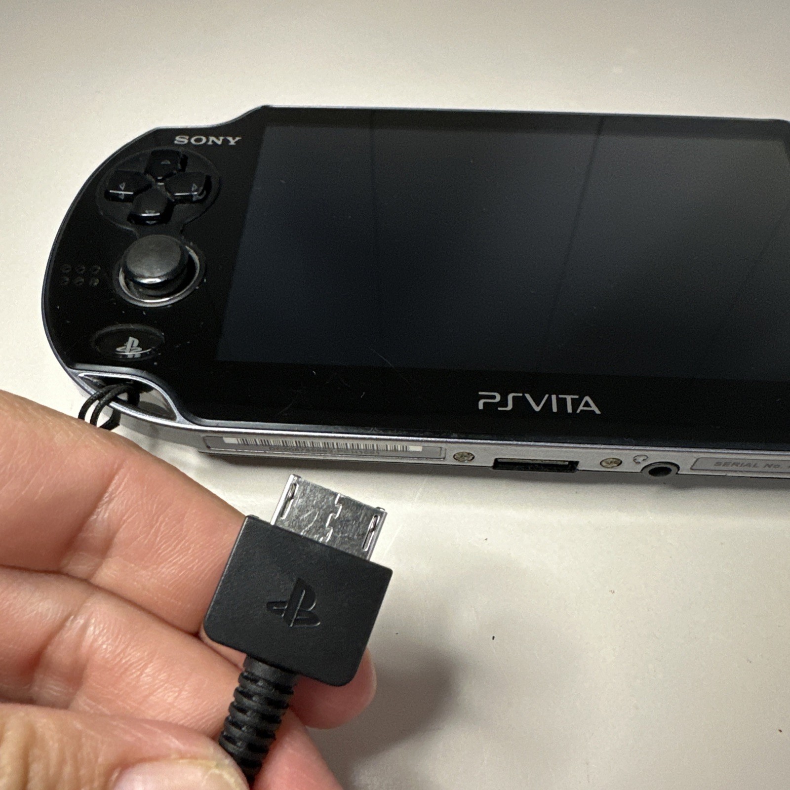 Sony PS Vita PCH-1101 Limited Edition Handheld System – Crystal Black With Game.
