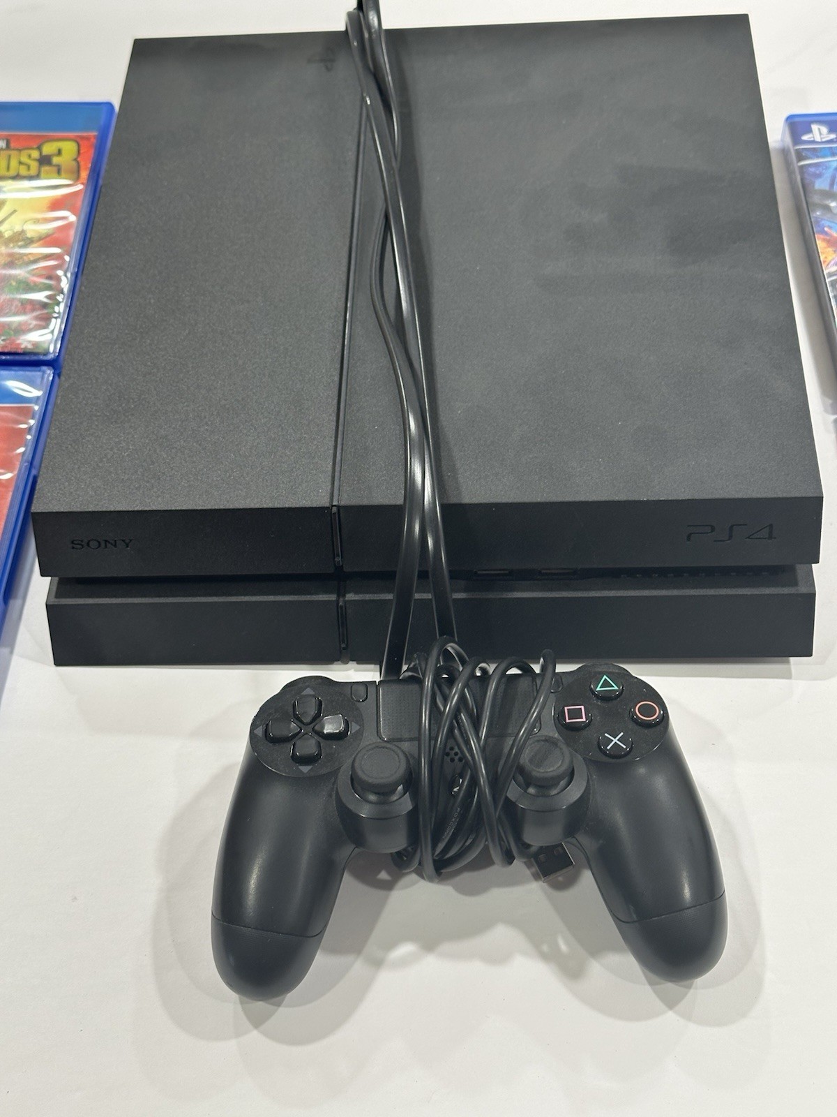 Playstation Four Lot ( PS4 Factory Reset & 4 Games Included) with controller