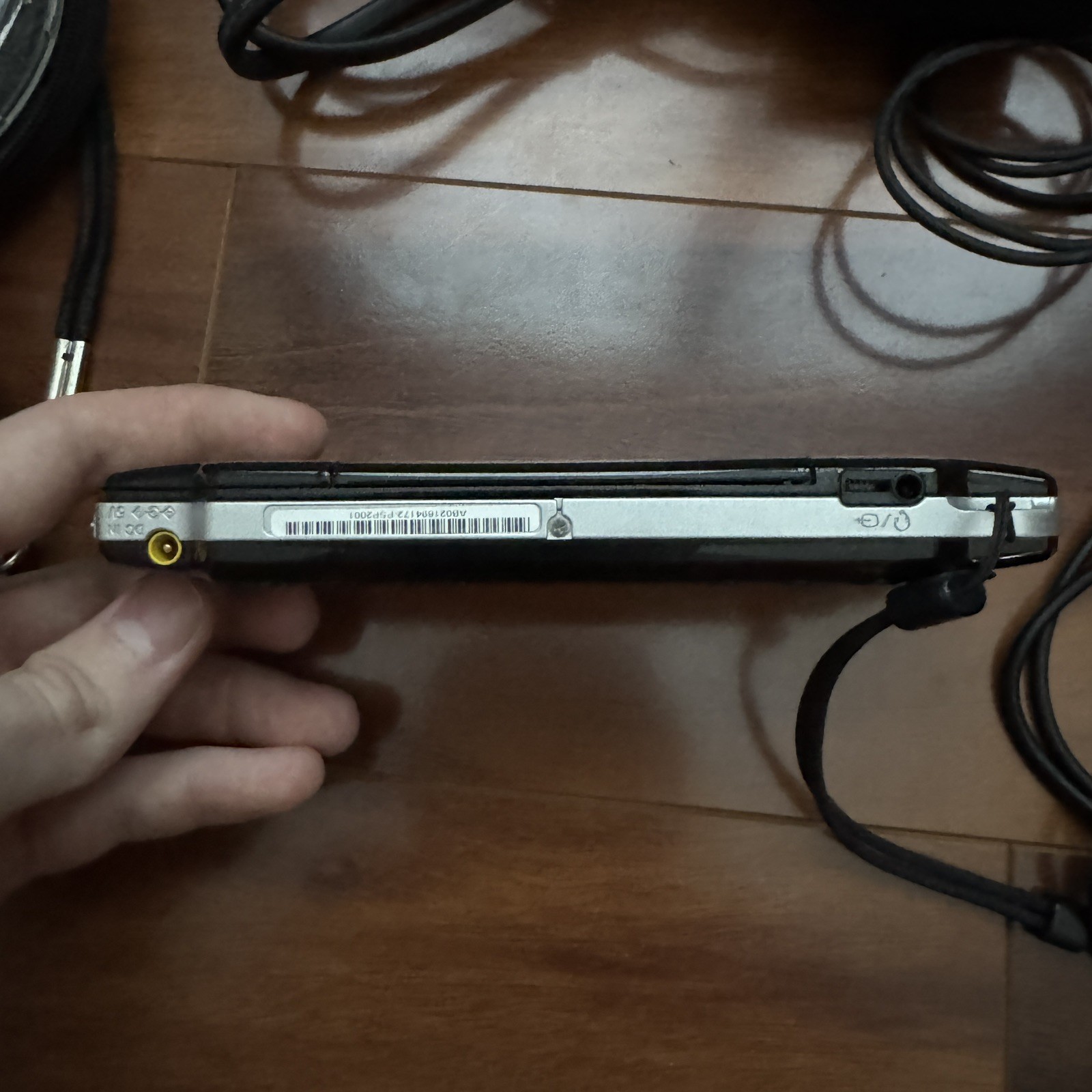 PSP 2001 Piano Black Console Powers On *Includes cables* – No Battery
