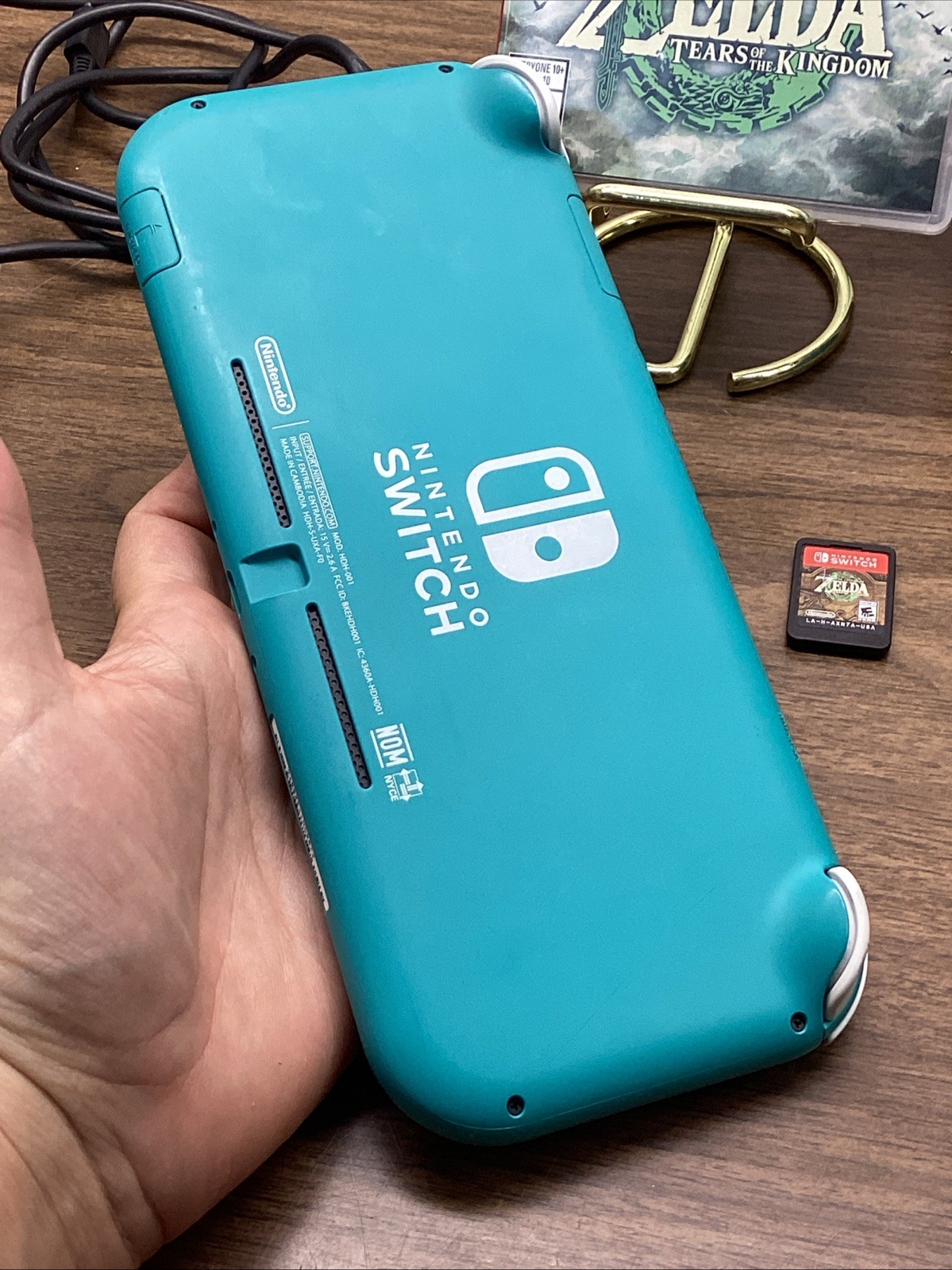 Nintendo Switch Lite Turquoise Teal Handheld Console Bundle with Zelda Game