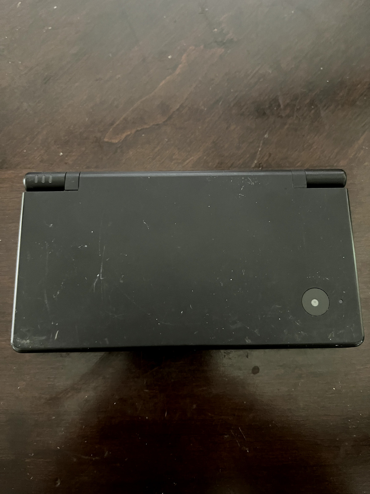 Nintendo DSi Black Edition, charger included, works great.