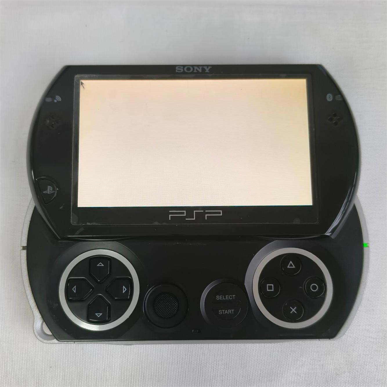 Sony PSP GO console Black with Charger PSP-N1003 Screen with protect