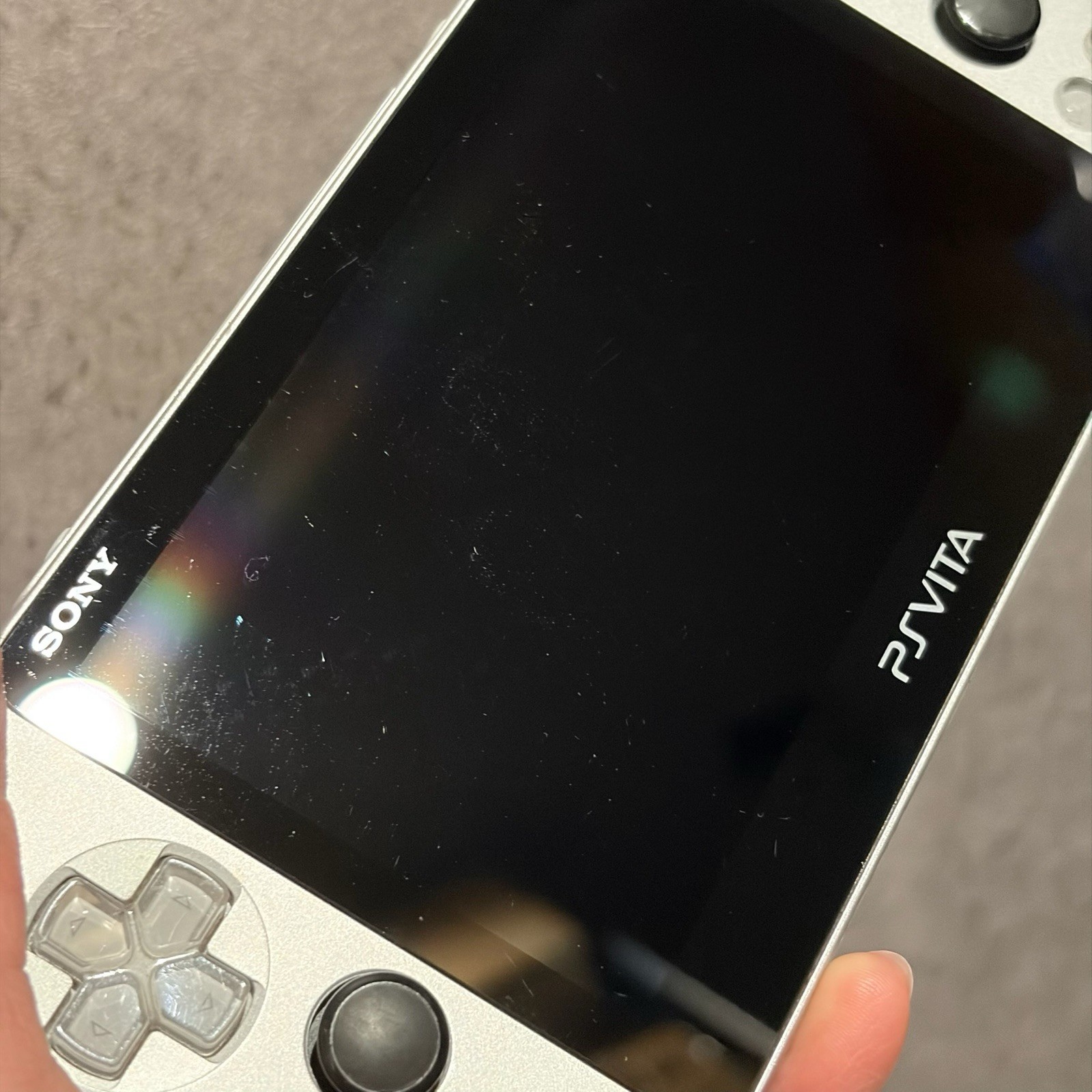 SONY PS Vita PCH-2000 Console Silver Very Good Fast Shipping No joystick drift.