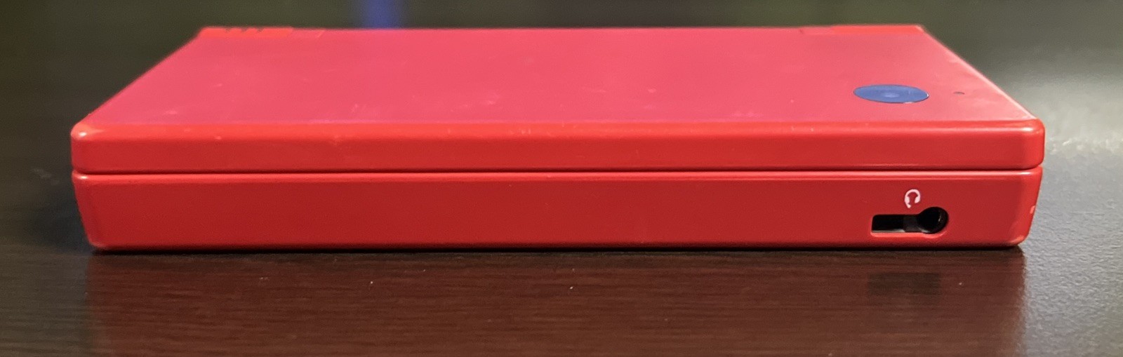 Nintendo DSi Red Console Only. Works. Used. Charger Not Included