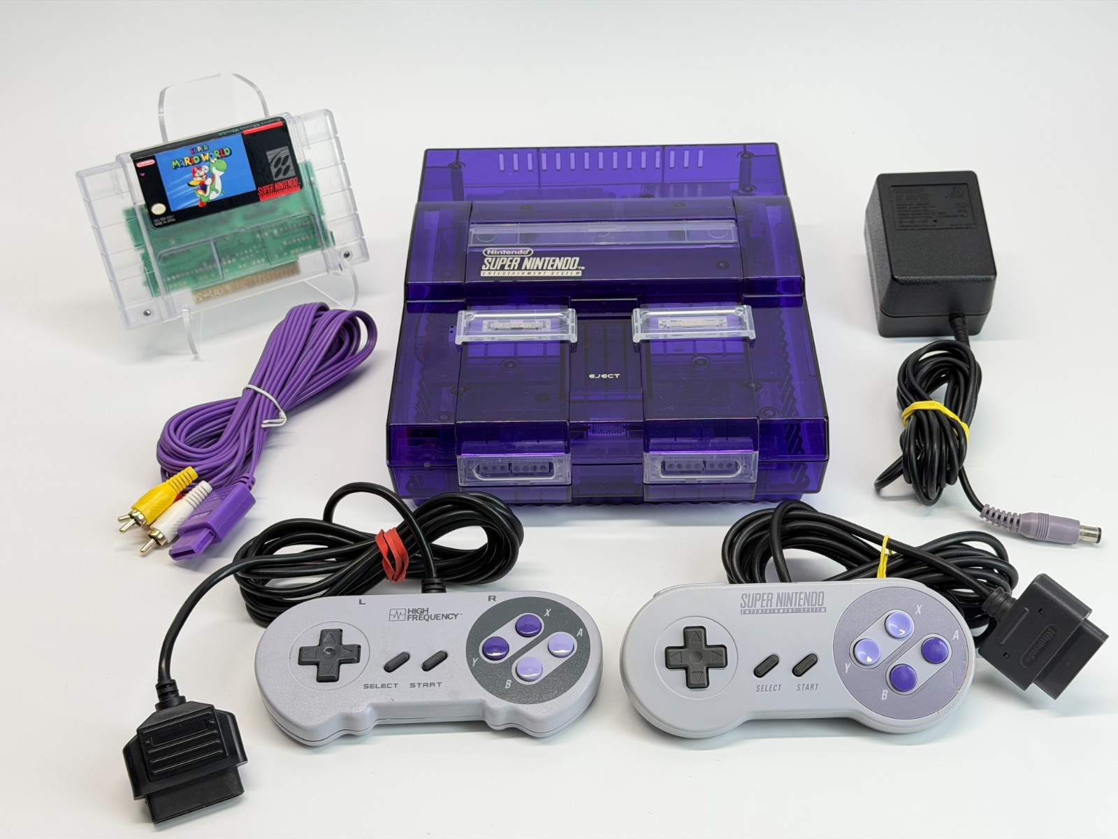 Super Nintendo – New Clear Purple Shell – System Bundle w/Super Mario World