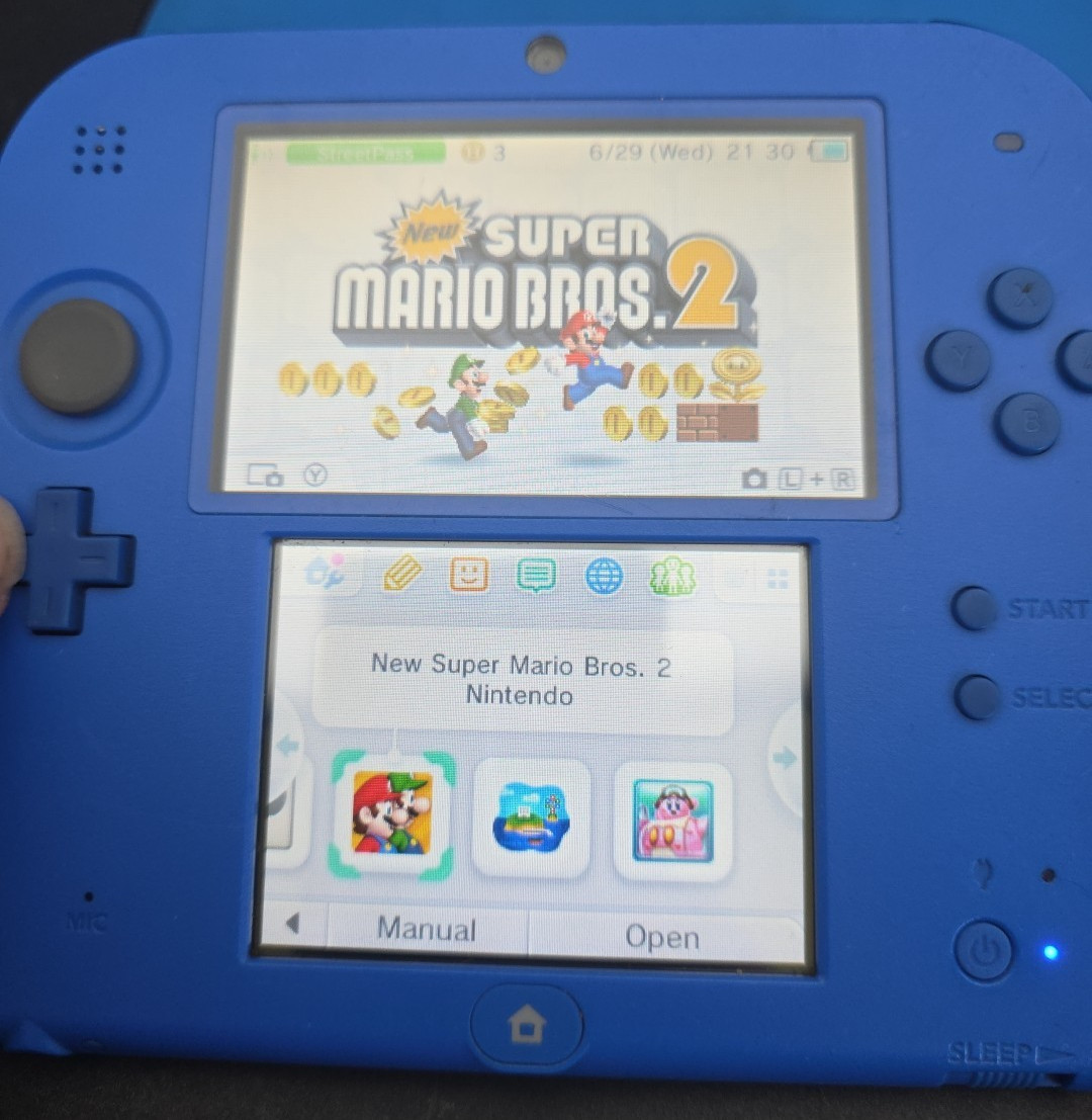 Nintendo 2DS Red Black Handheld System Wi-Fi with Charger, Case And Mario 2