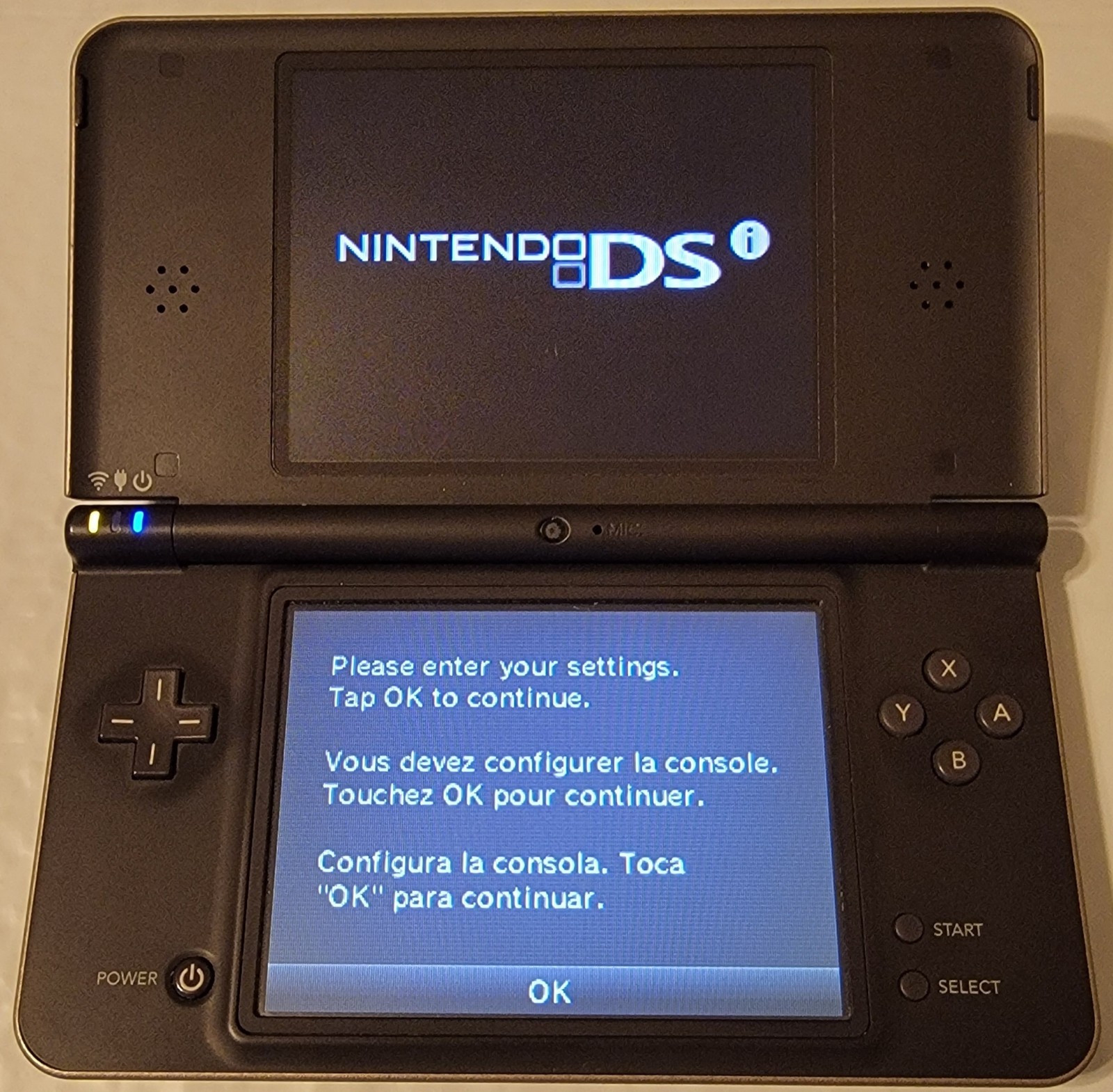 Nintendo DSi XL Bronze w/ Charger & 2 Games Mario 64 DS & New Super Mario Bros