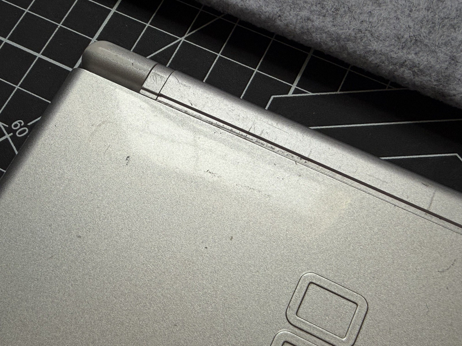 Nintendo DS Lite Used OEM Silver W/ R4 & 2GB SD – 100% Tested Region Free