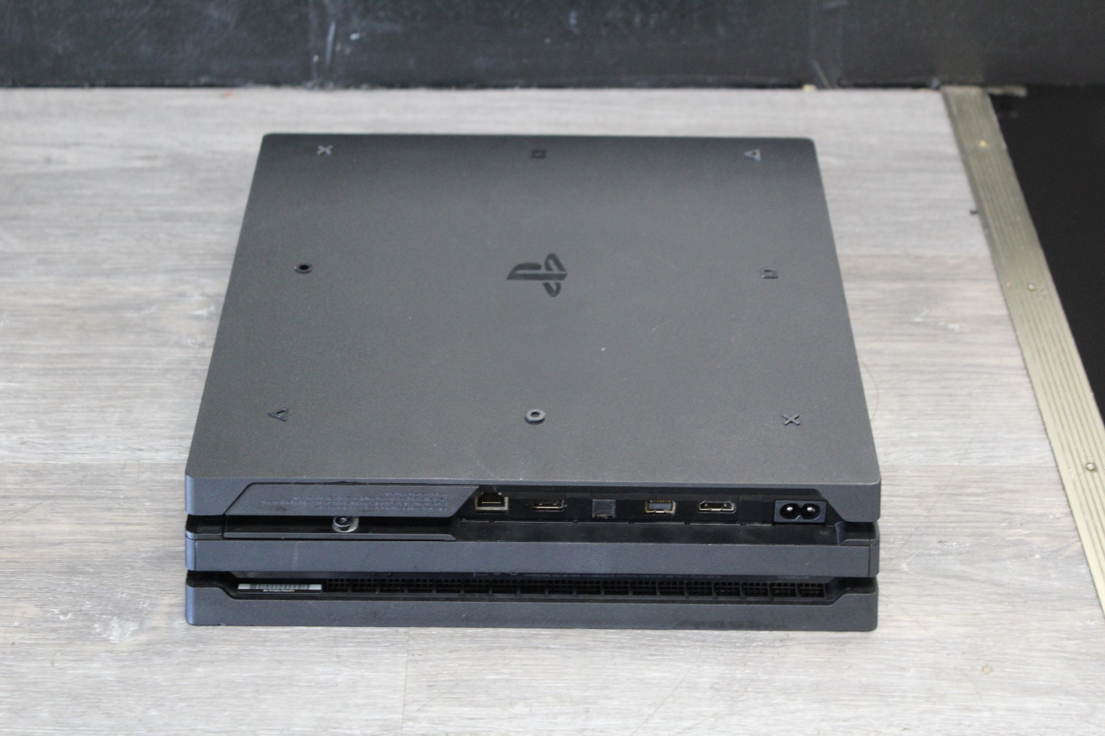 Sony PlayStation 4 Pro 1TB Game Console – Jet Black with Camo Controller