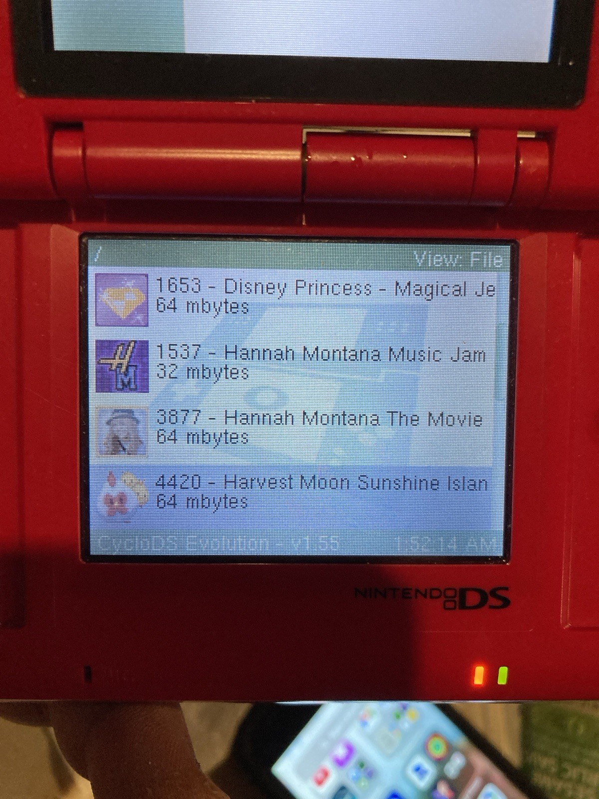Nintendo DS Red Handheld Dual Screen Console with EVOLUTION MULTI-GAMES ON 2GB