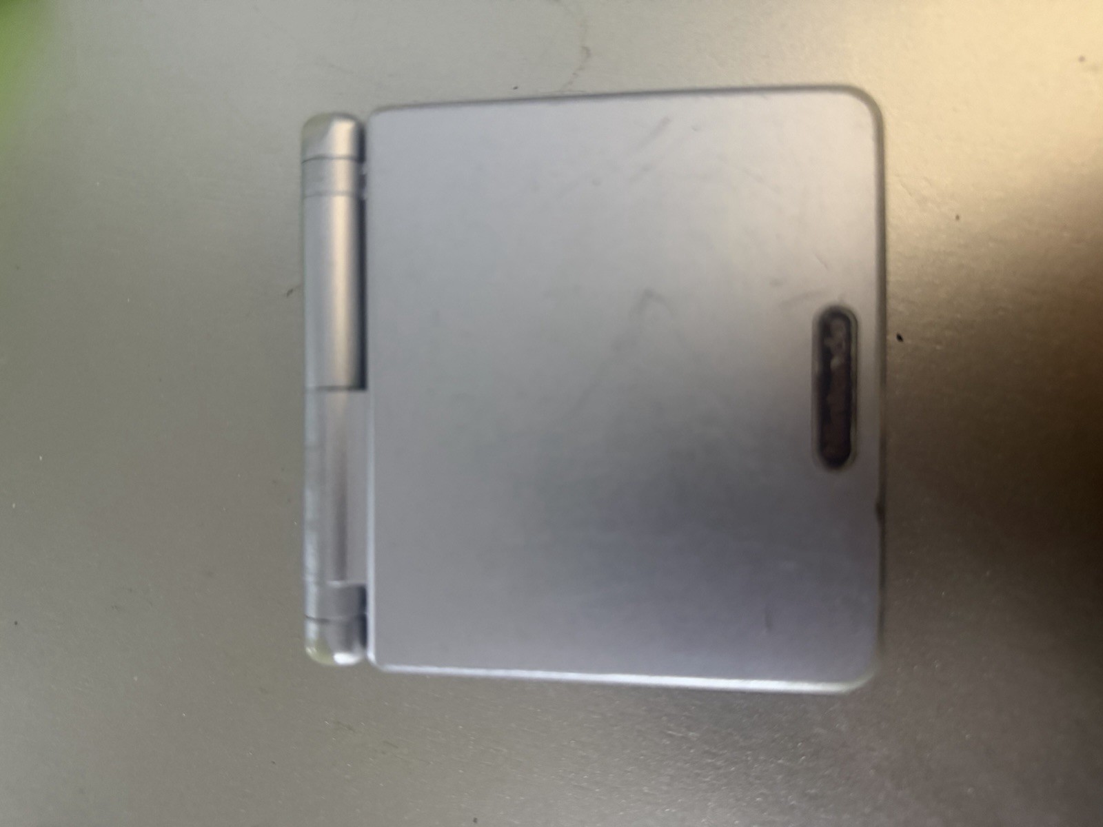 Nintendo Game Boy Advance SP Handheld System – Silver No Charger. No Games.