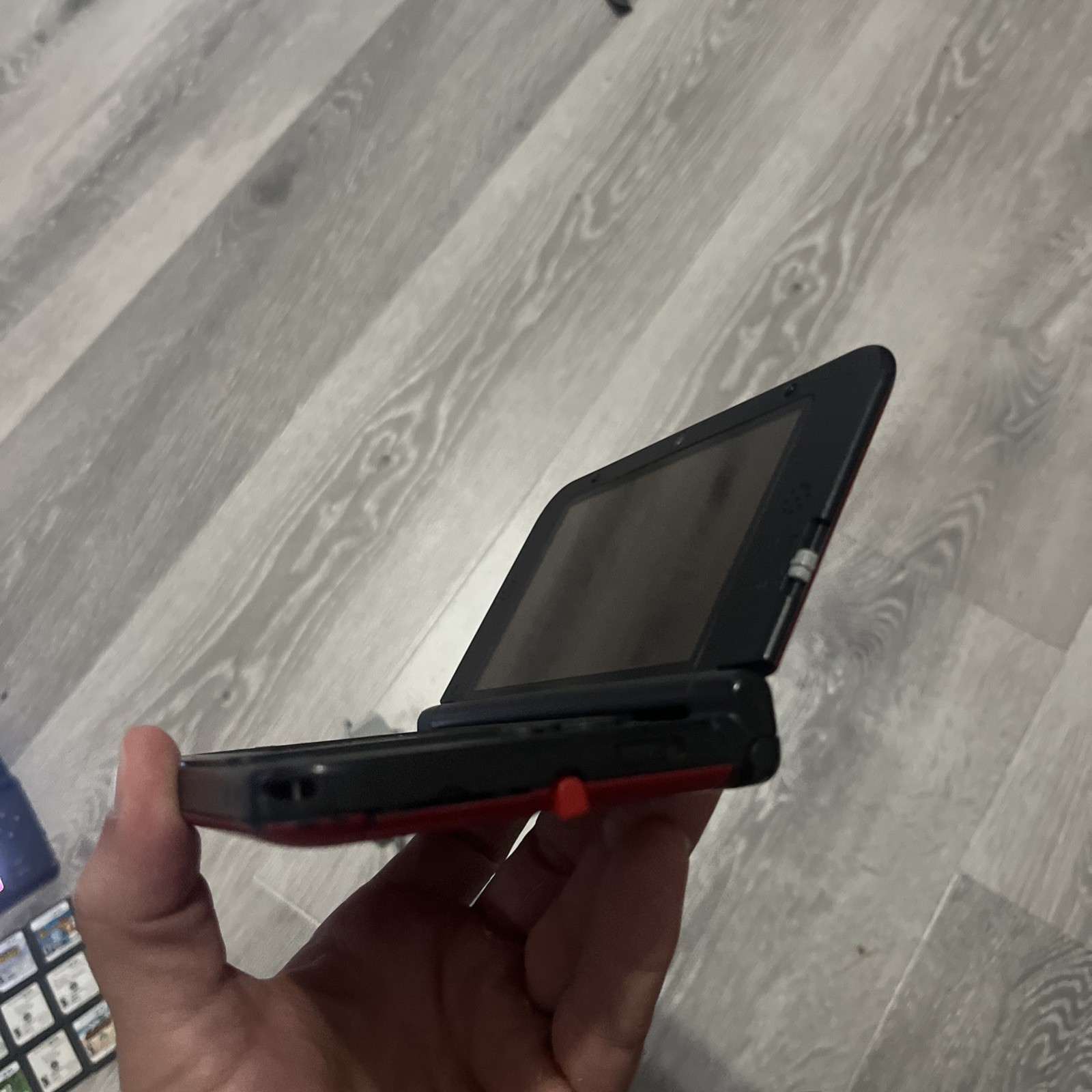 Nintendo 3DS XL Handheld Console – Red / Black (Model SPR-001) Charger/4 Games