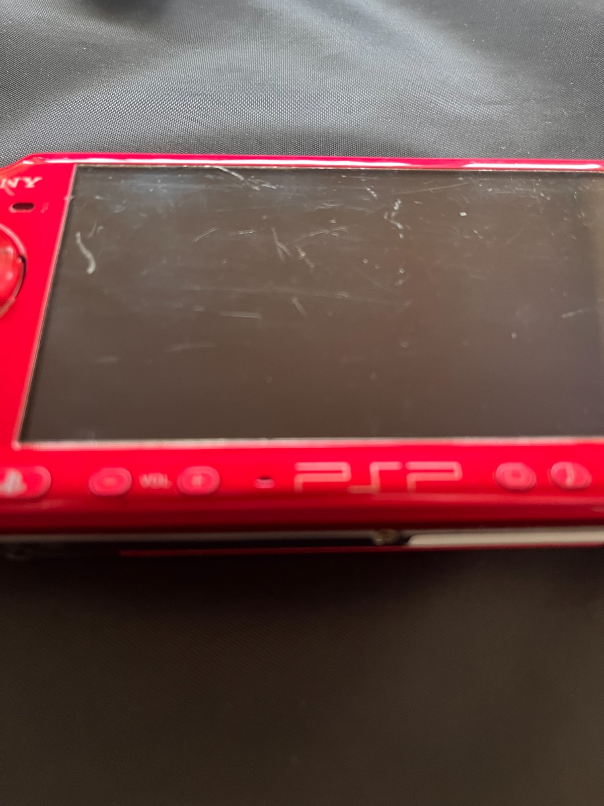 SONY PSP-3000 Radiant Red + AC charger + 8GB Memory – Working, Rank B