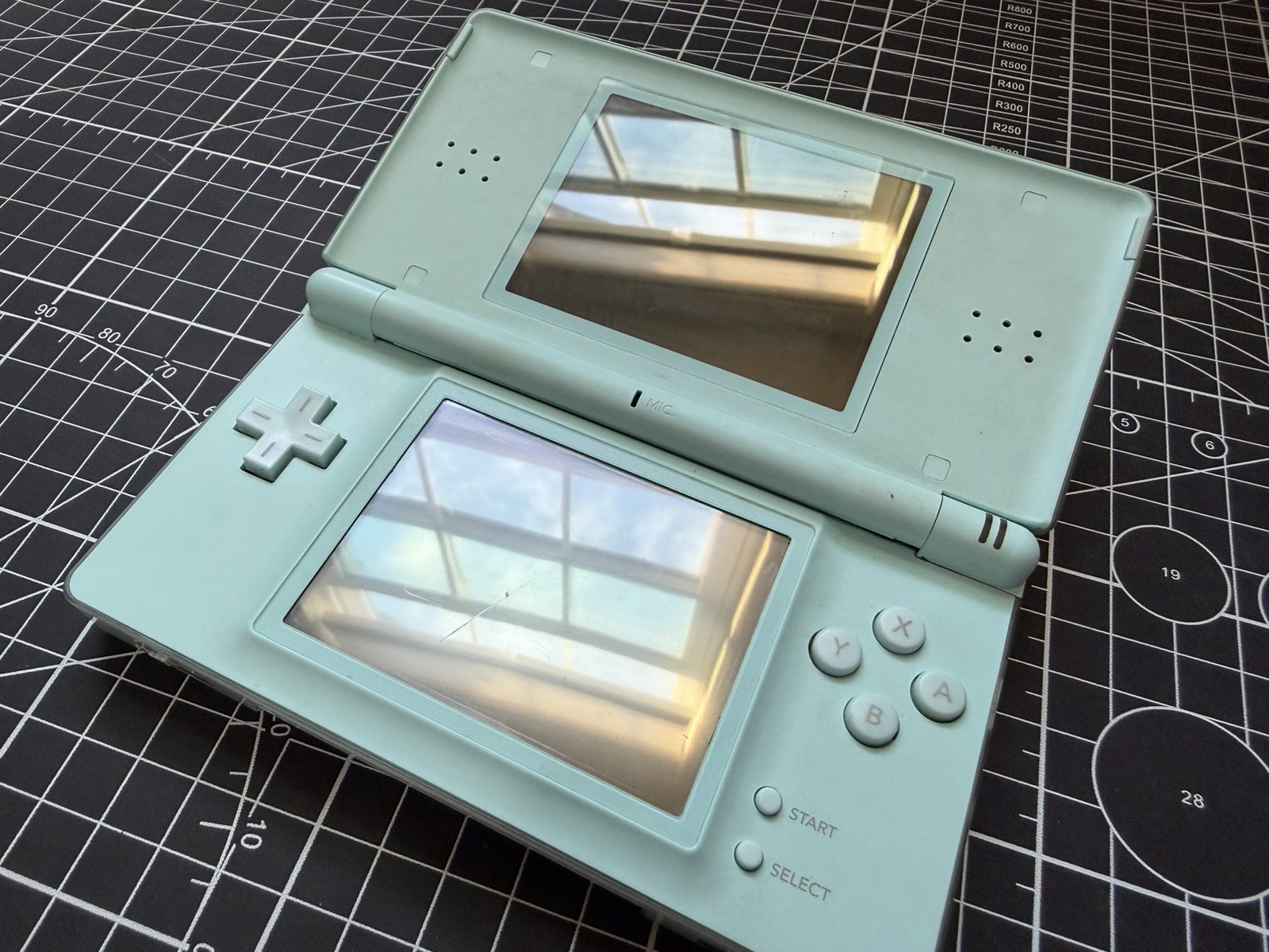 Nintendo DS Lite Used OEM Silver W/ R4 & 2GB SD – 100% Tested Region Free