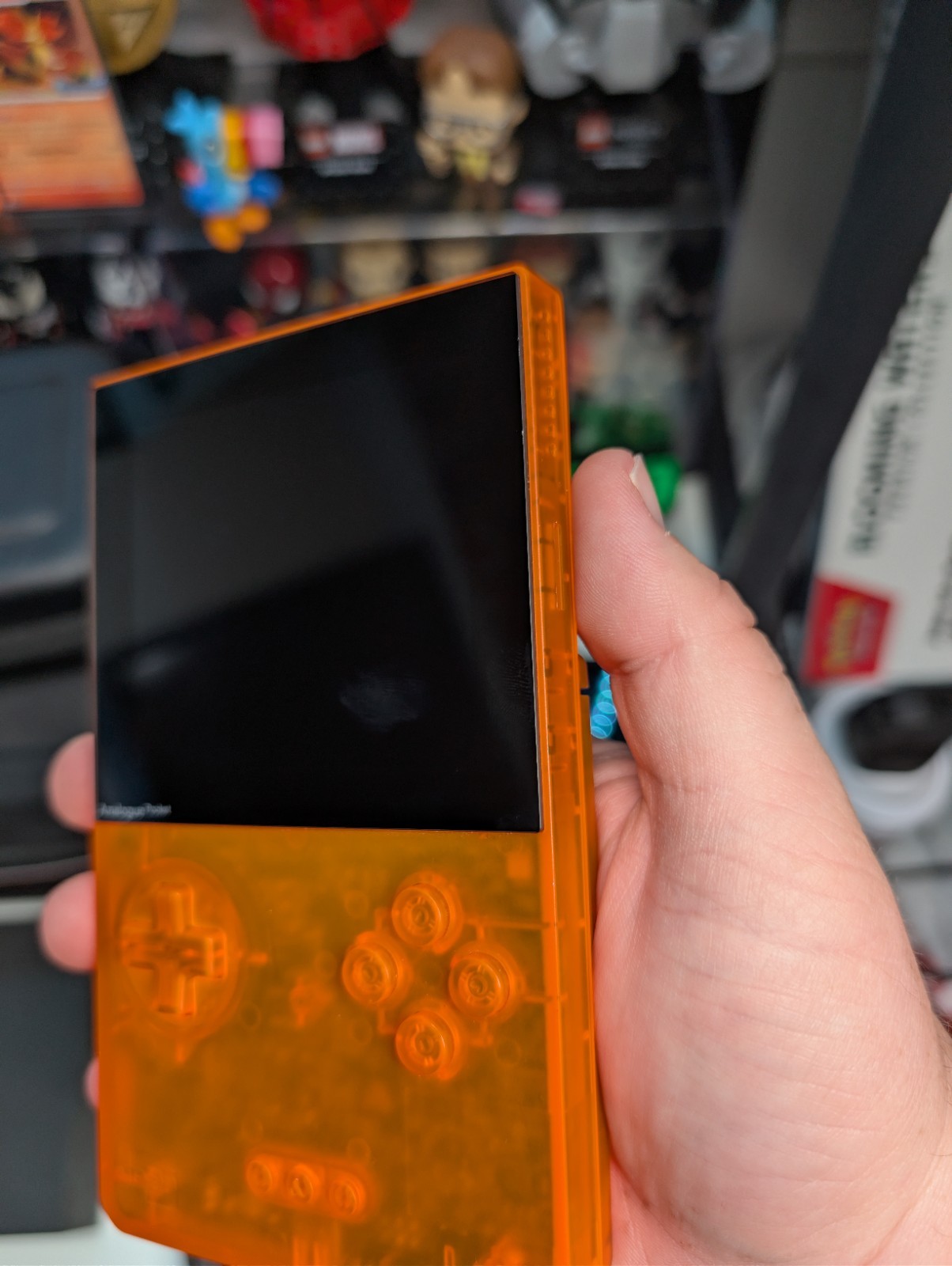 Analogue Pocket Handheld – Transparent Orange Limited Edition w/ pokemon silver