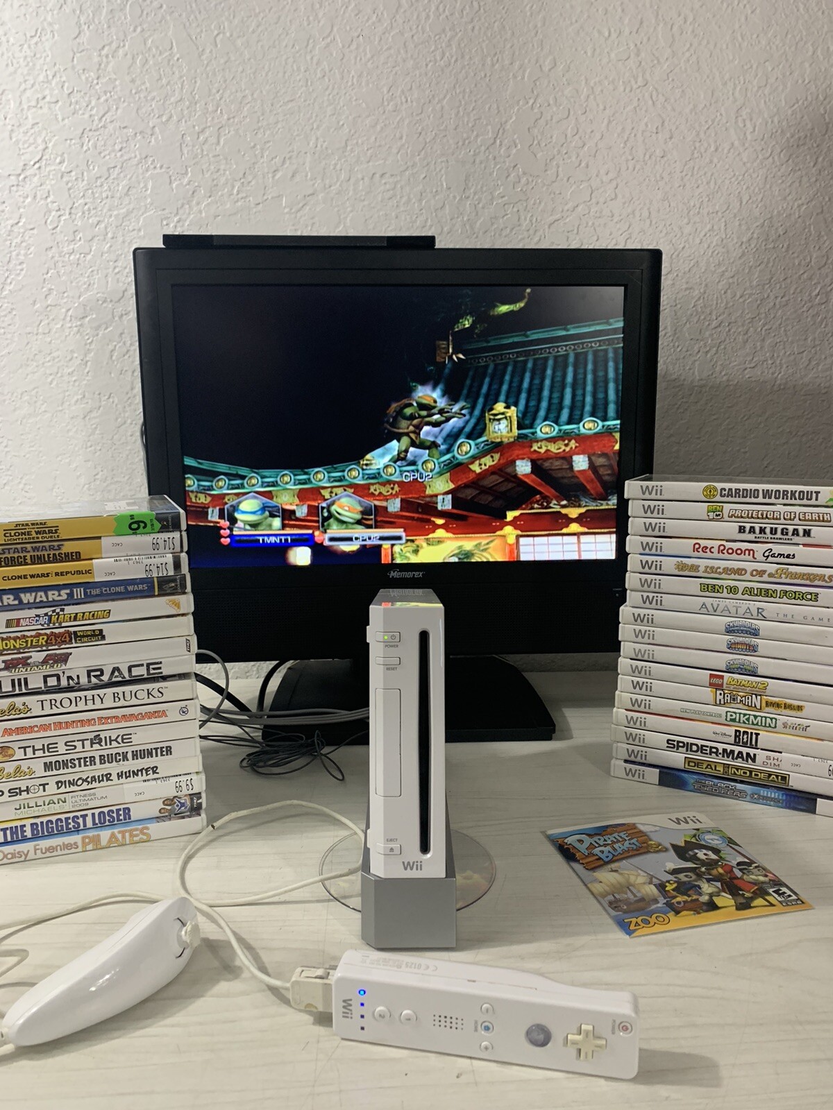 Nintendo RVL-100 Wii Bundle with 35 Games 1 controller 1 Nunchuk Stand Cables