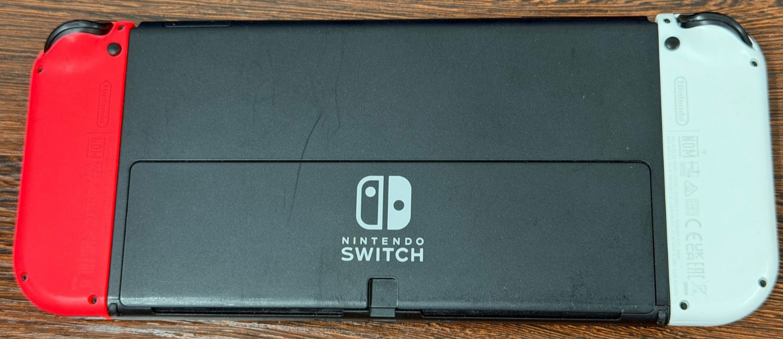 Nintendo Switch OLED Model 64GB Neon Red White Joycons – Good Used Condition