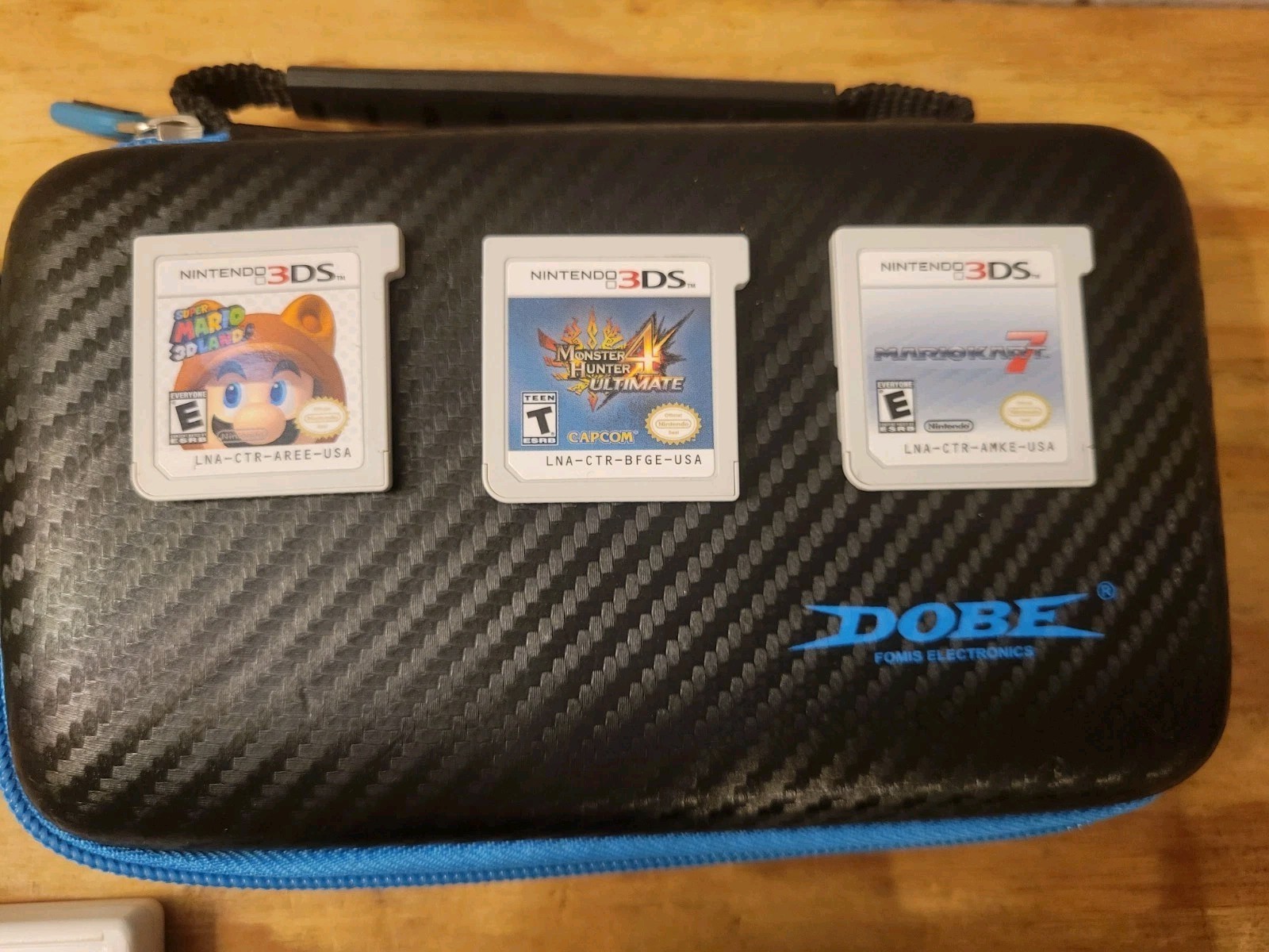 8 Games — 2DS XL Turquoise Blue Game Console with Accessories and Charger