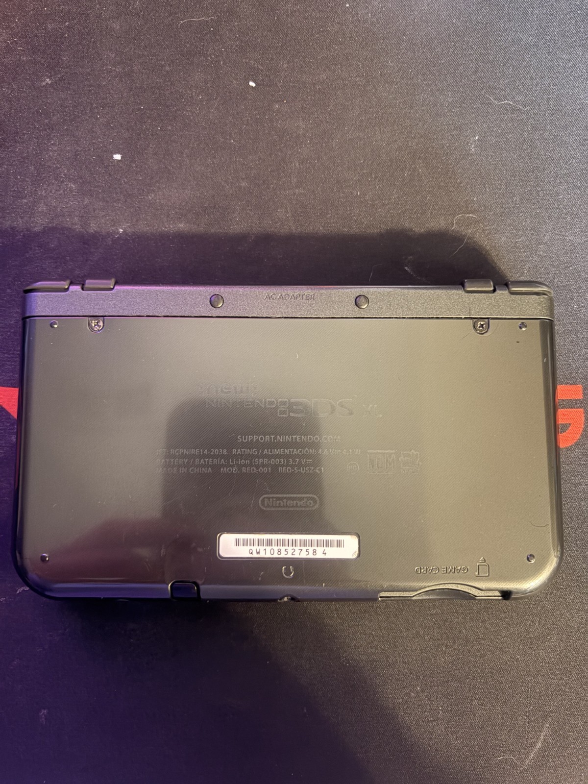 New Nintendo 3DS XL Metallic Black -32GB SD Card + Pokemon X & Case – NO CHARGER