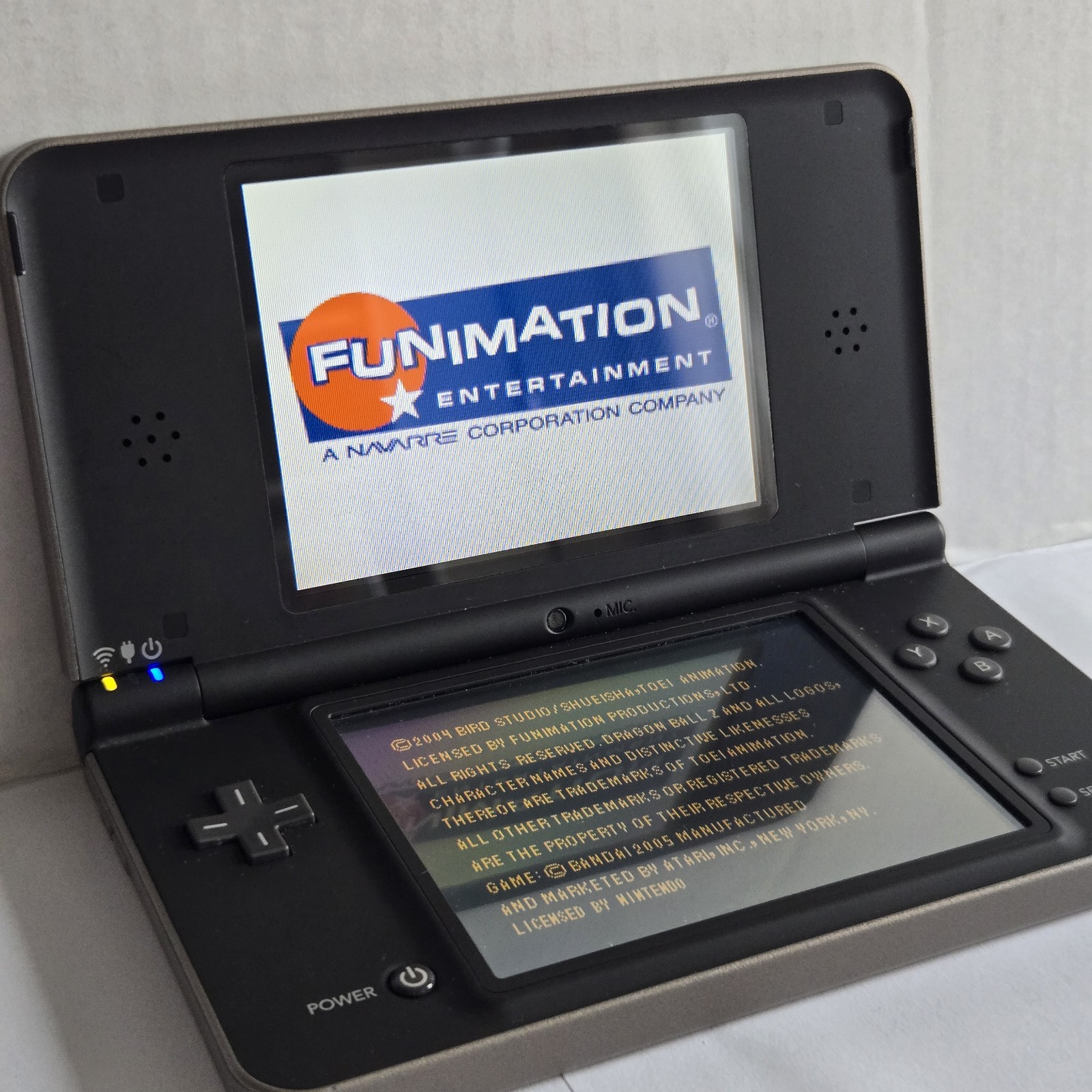 Nintendo DSi XL Bronze/Black Handheld Console Wi-Fi UTL-001 NTSC-U/C