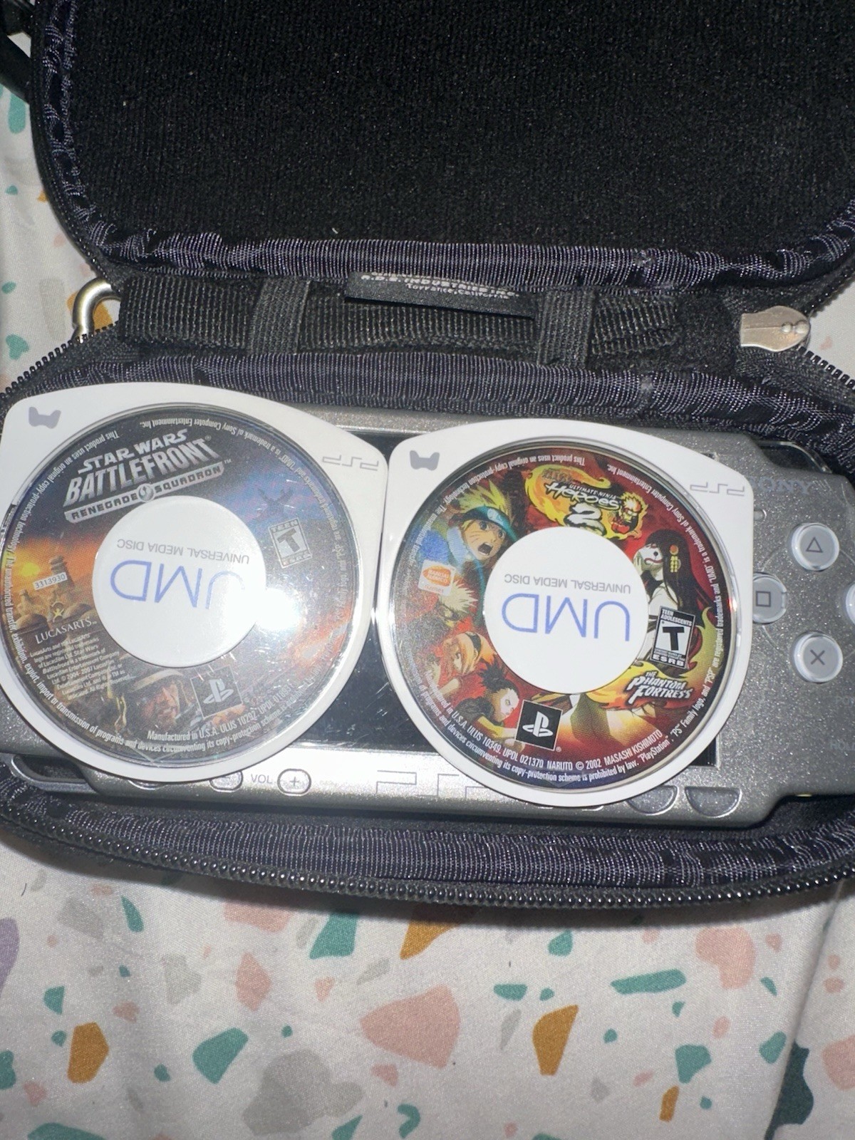 PSP 2001 Silver CONSOLE W/2 Games And Charger Tested