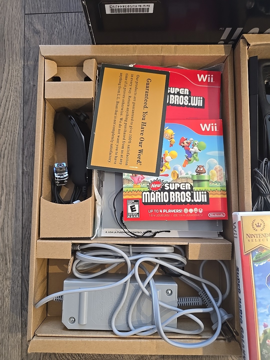 Nintendo Wii Black Console bundle CIB featuring New Super Mario Bros Galaxy 2