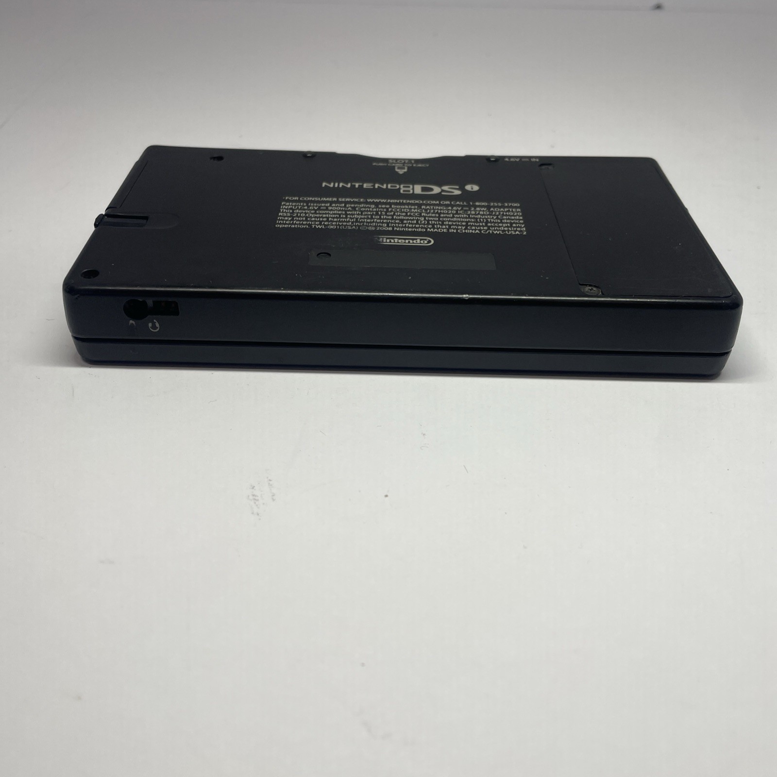 Nintendo DSi TWL-001 Black handheld system w/ Mario Bros -needs charger
