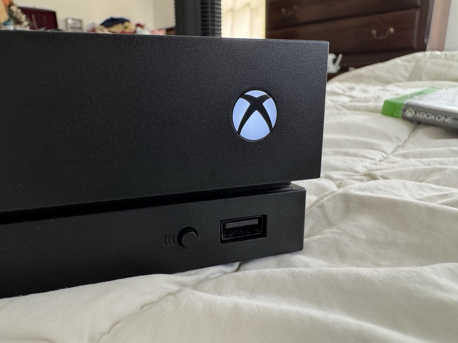 Microsoft Xbox One x – 1TB – Power and HDMI Cord- 2 Controllers- 2 Games