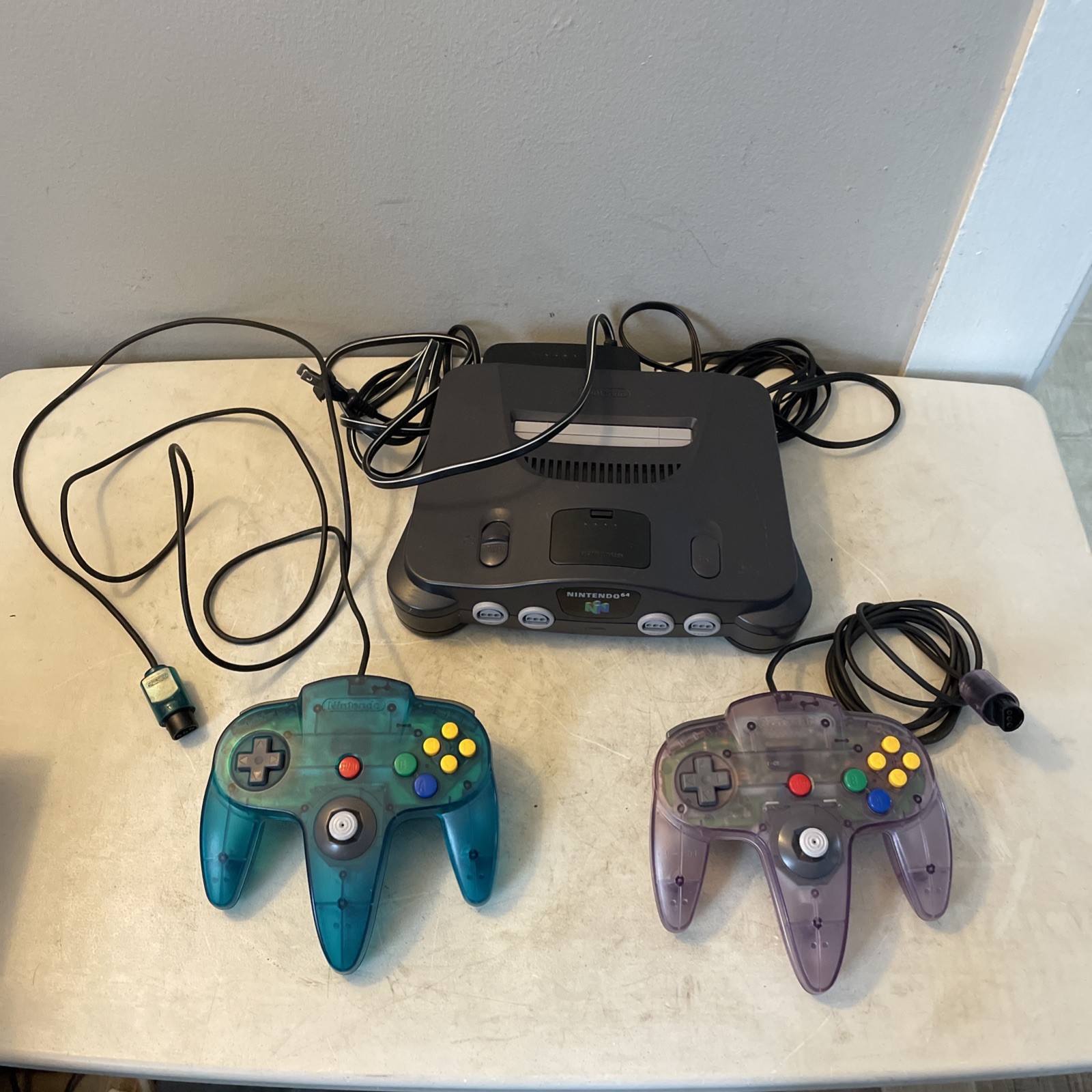Nintendo 64 Console Bundle | Original W/ Ice Blue & Atomic Purple Controllers