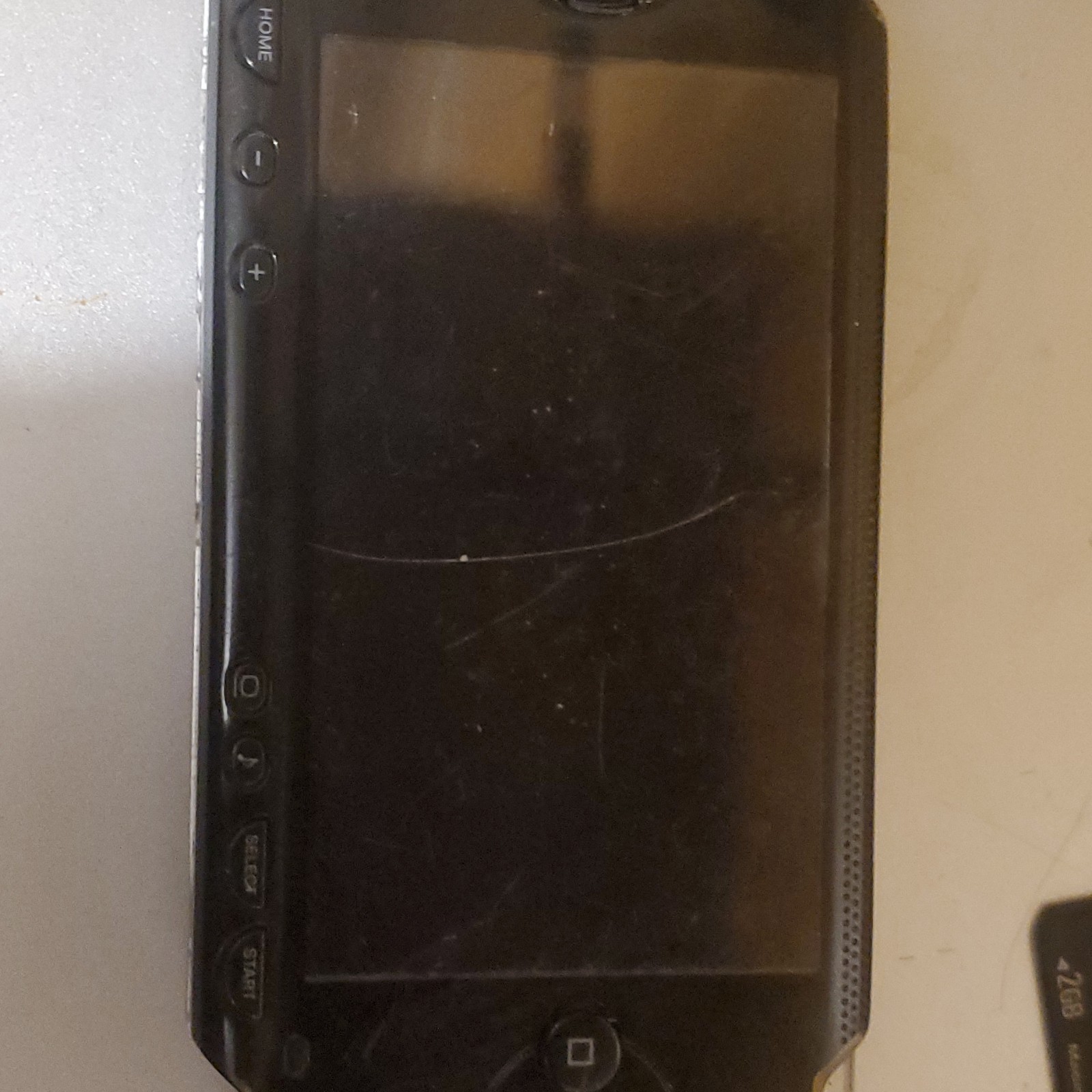 Sony PSP-1001 Black Handheld Console with 2GB Memory Stick Headphone Jack