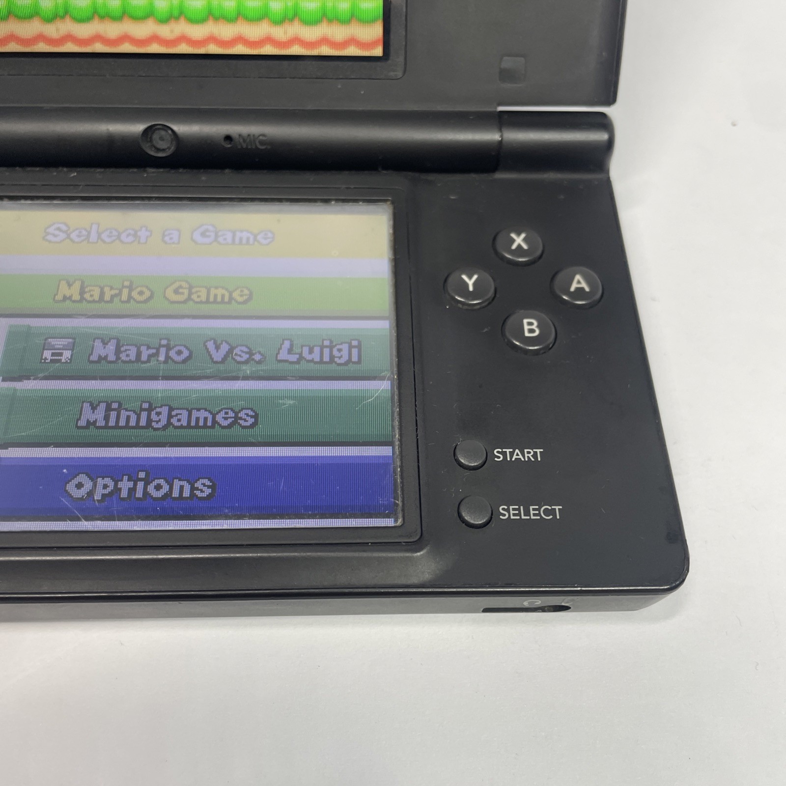 Nintendo DSi TWL-001 Black handheld system w/ Mario Bros -needs charger