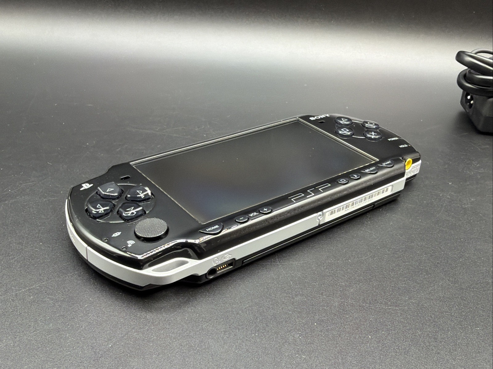 PSP 2001 Console W/Memory Stick 2GB AND CHARGER Working/ tested. W/ Loco Roco