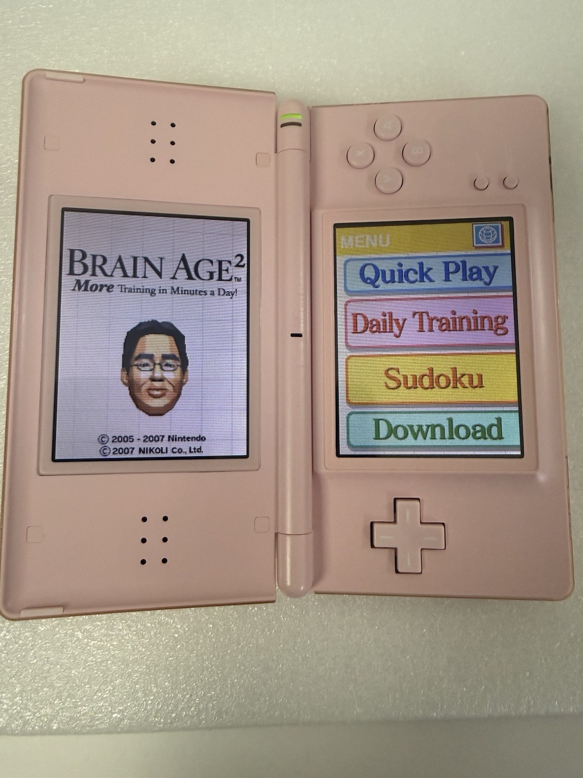 Nintendo DS Lite Console USG-001 w/charger – Coral Pink – GBA GOOD CLEAN TESTED