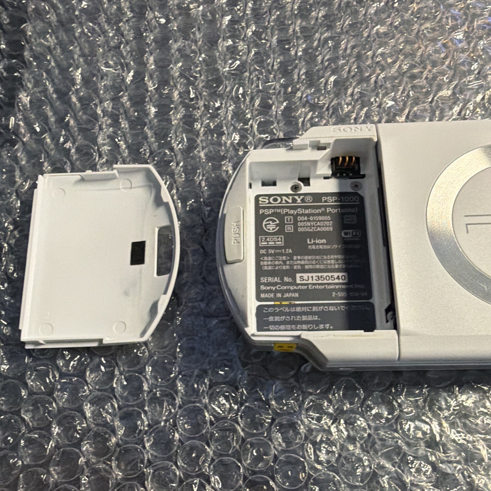 Sony PSP-1000 White Handheld Console Wi-Fi, Headphone Jack, 64MB