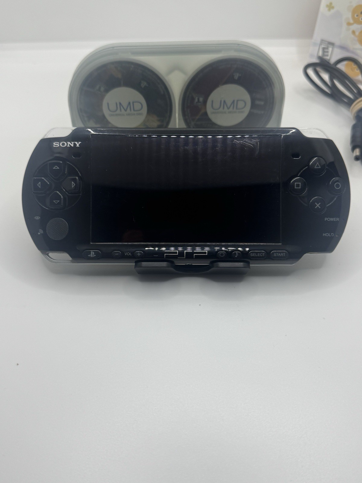 Sony PSP 3001 Portable Handheld Console System memory stick and 5 UMD Cleaned