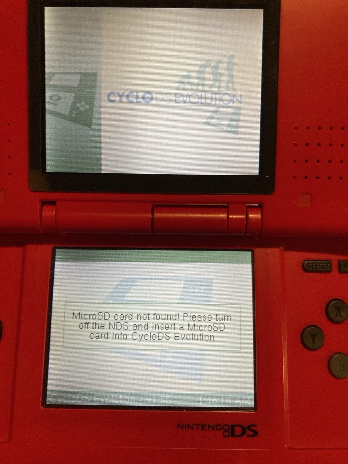 Nintendo DS Red Handheld Dual Screen Console with EVOLUTION MULTI-GAMES ON 2GB