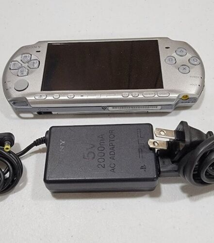 Official Sony Silver PSP 3000 with upgraded battery and charger Region FREE