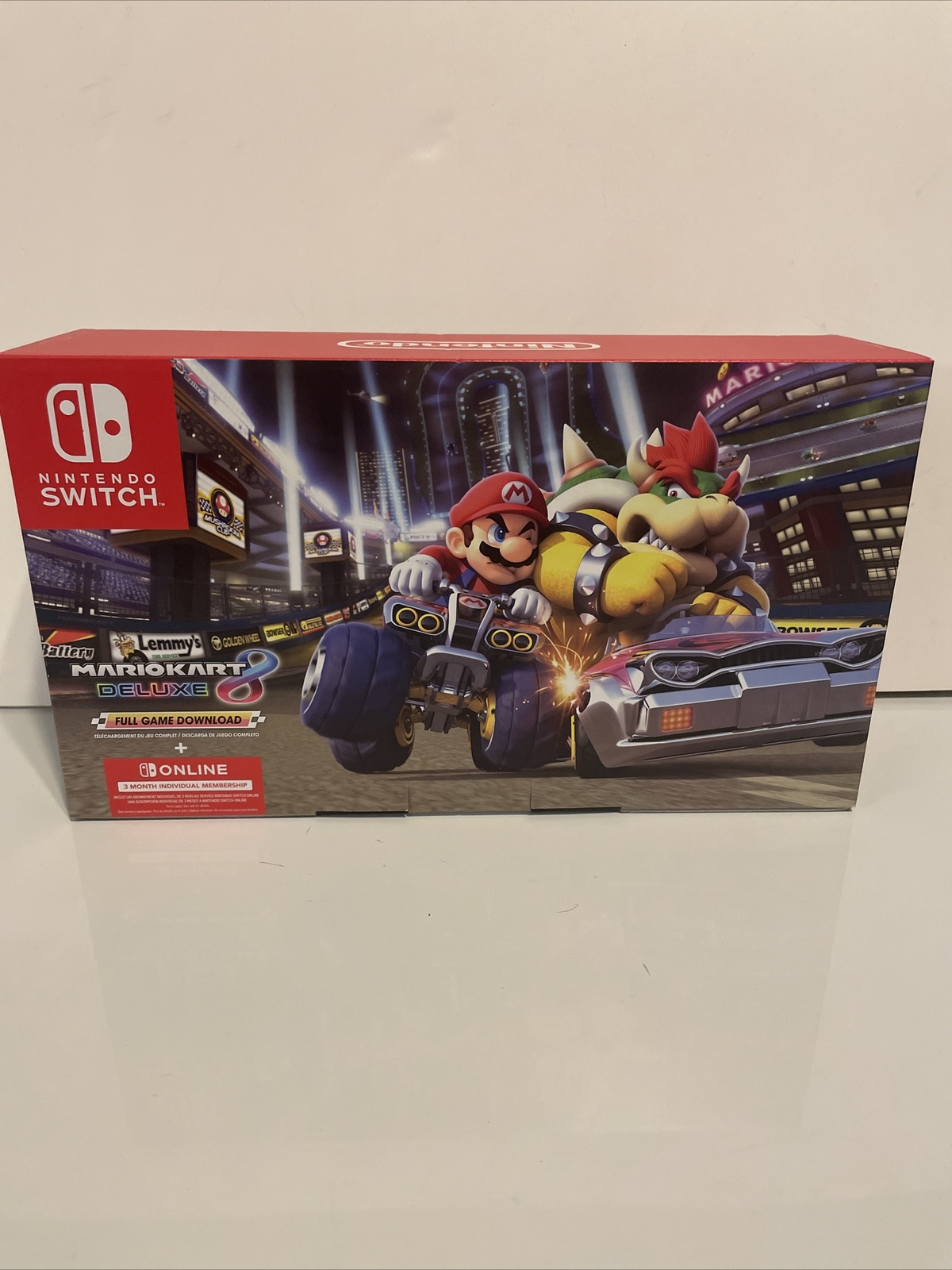 Nintendo Switch with Blue and Red Joy-Con Controllers and Mario Kart 8 Bundle